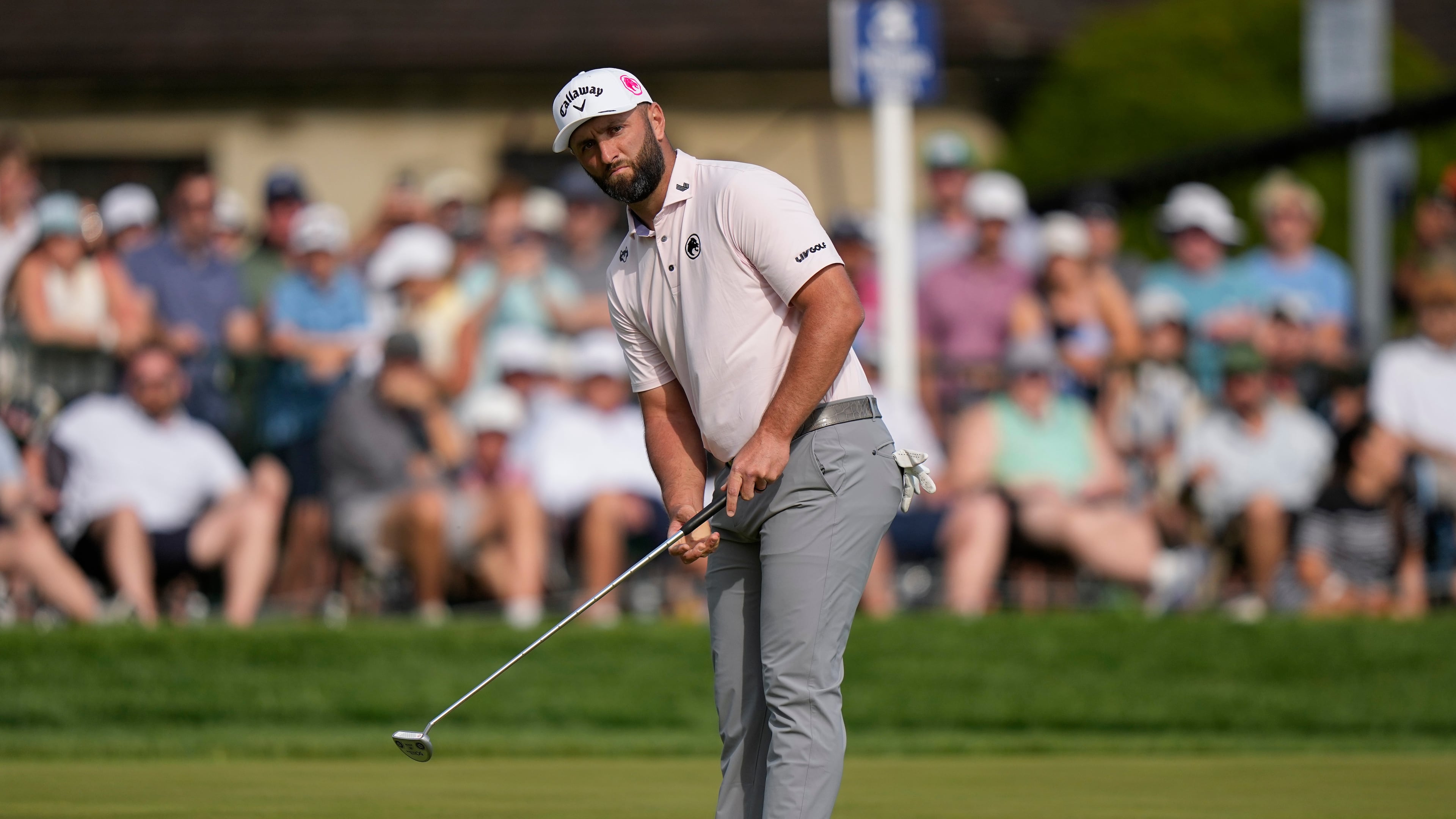 Jon Rahm, of Spain, putts on the 18th green during the third round of the PGA Championship golf tournament at Aronimink Golf Club, Saturday, May 16, 2026, in Newtown Square, PA. (AP Photo/Frank Franklin II)