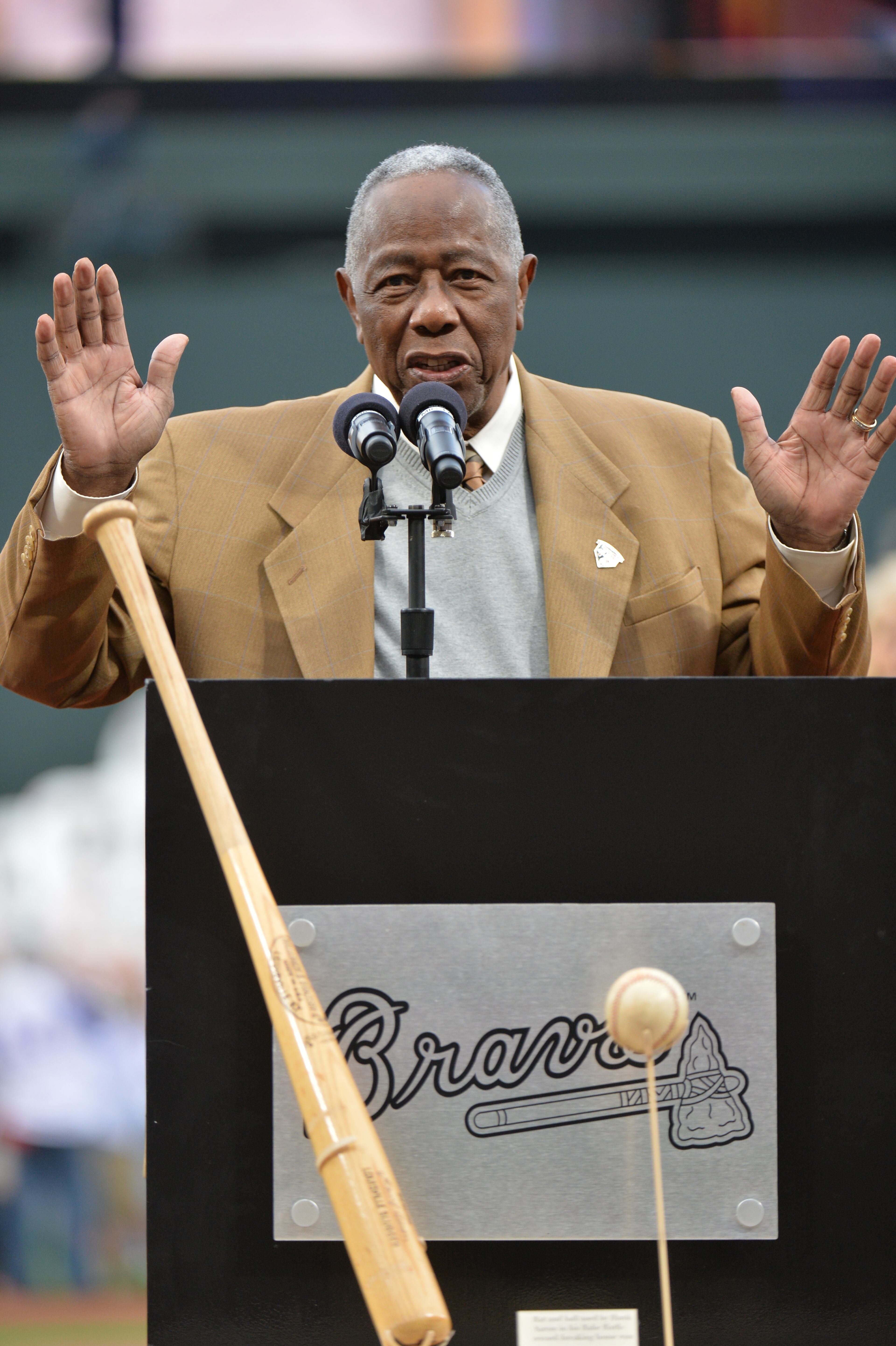 Hank Aaron speaks during a pregame ceremony to recognize the 40th anniversary of Hank Aaron's historic 715th home run before the season opener at Turner Field in Atlanta on Tuesday, April 8, 2014. HYOSUB SHIN / HSHIN@AJC.COM