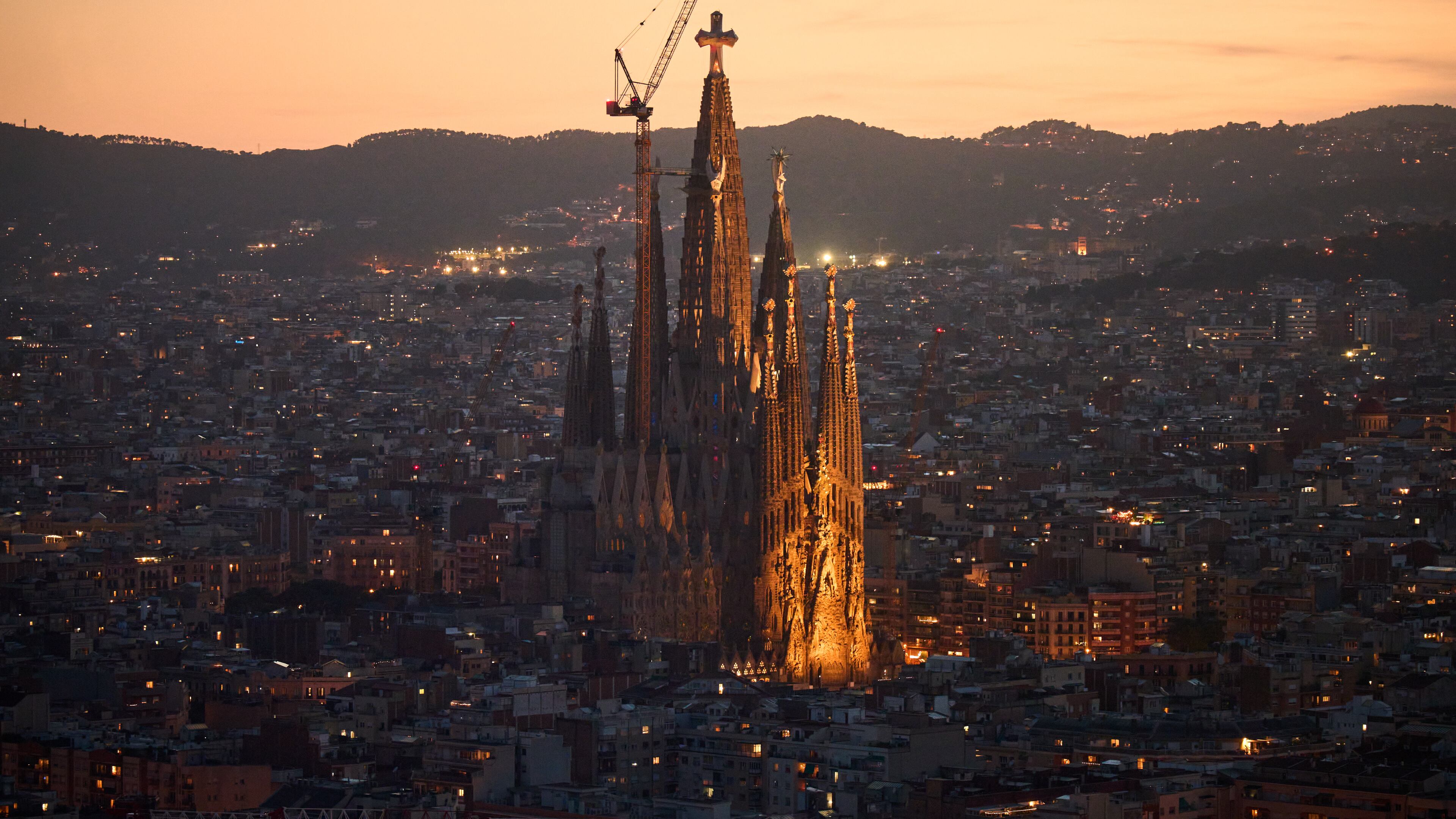 Antoni Gaudí's Basilica of the Sagrada Família stands at dusk as seen from the Mirador Torre Glòries in Barcelona, Spain, Tuesday, June 9, 2026. (AP Photo/Emilio Morenatti)