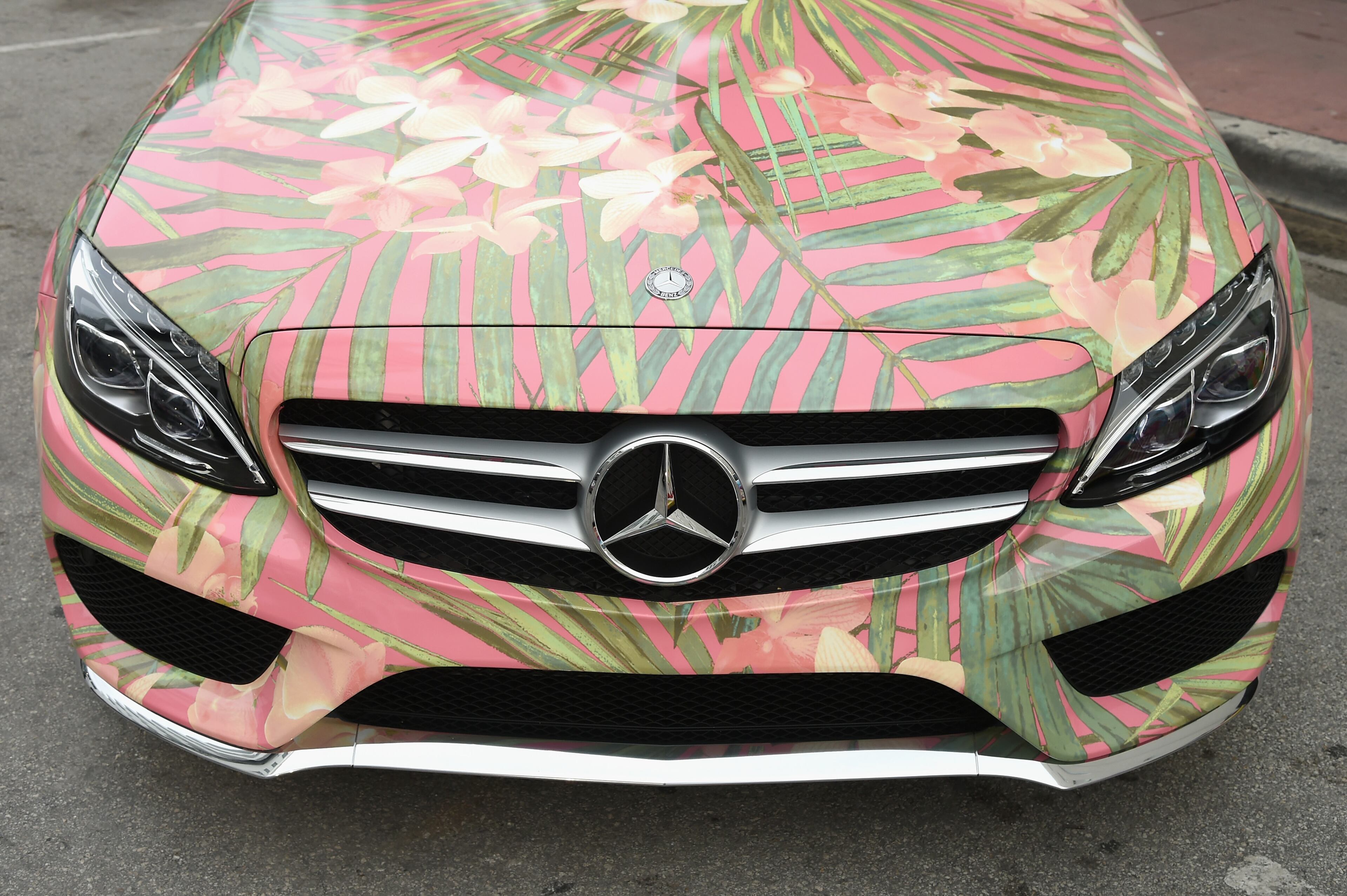 MIAMI BEACH, FL - JULY 17: A 2015 Mercedes-Benz C-Class featuring an exclusive design by Carmen Marc Valvo on display during Mercedes-Benz Fashion Week Swim 2015 at The Raleigh on July 17, 2014 in Miami Beach, Florida. (Photo by Andrew H. Walker/Getty Images for Mercedes-Benz Fashion Week )