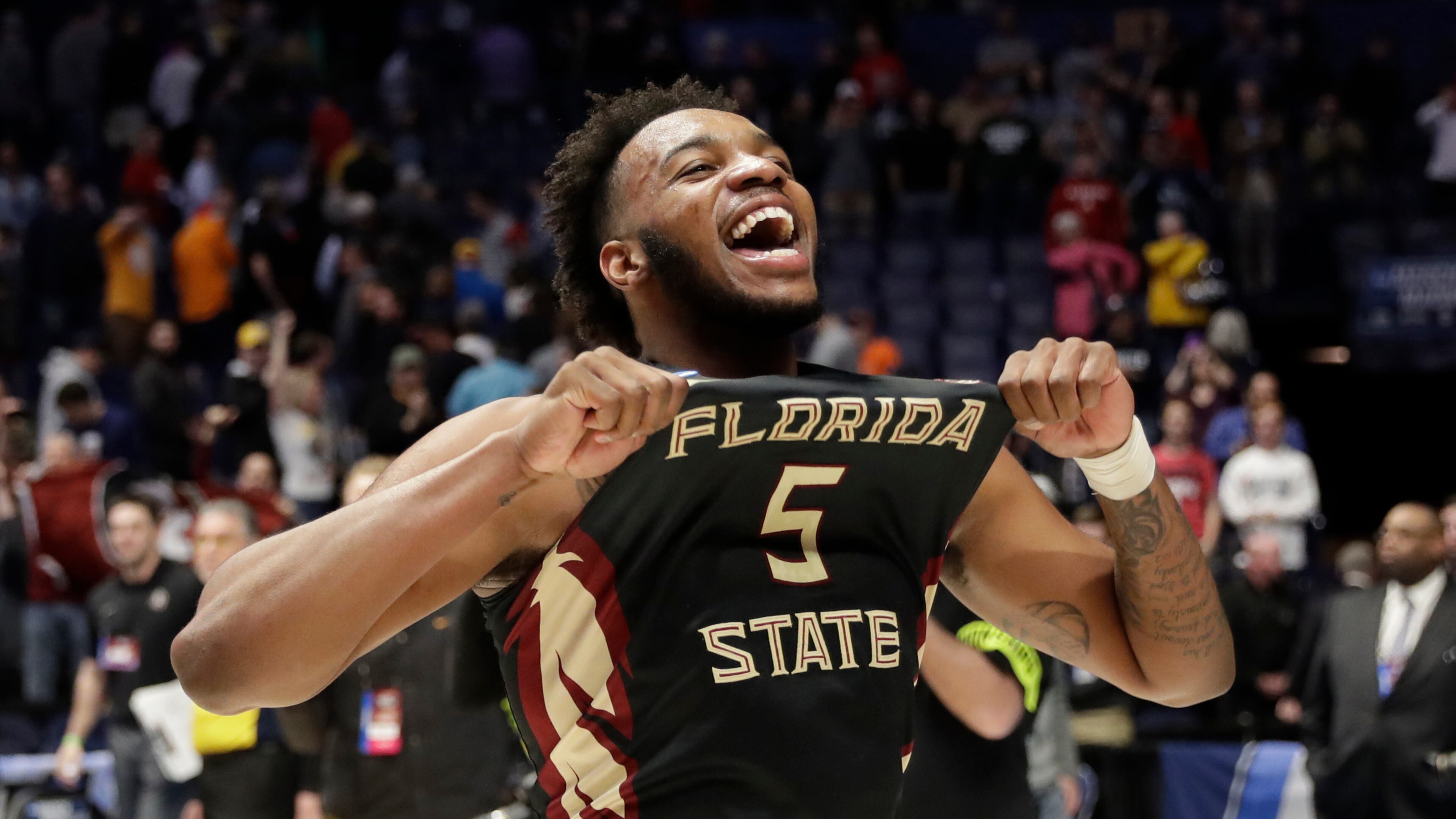 Florida State guard PJ Savoy (5), celebrates after defeating Xavier in a second-round game in the NCAA college basketball tournament in Nashville, Tenn., Sunday, March 18, 2018. Florida State defeated Xavier 75-70. (AP Photo/Mark Humphrey)