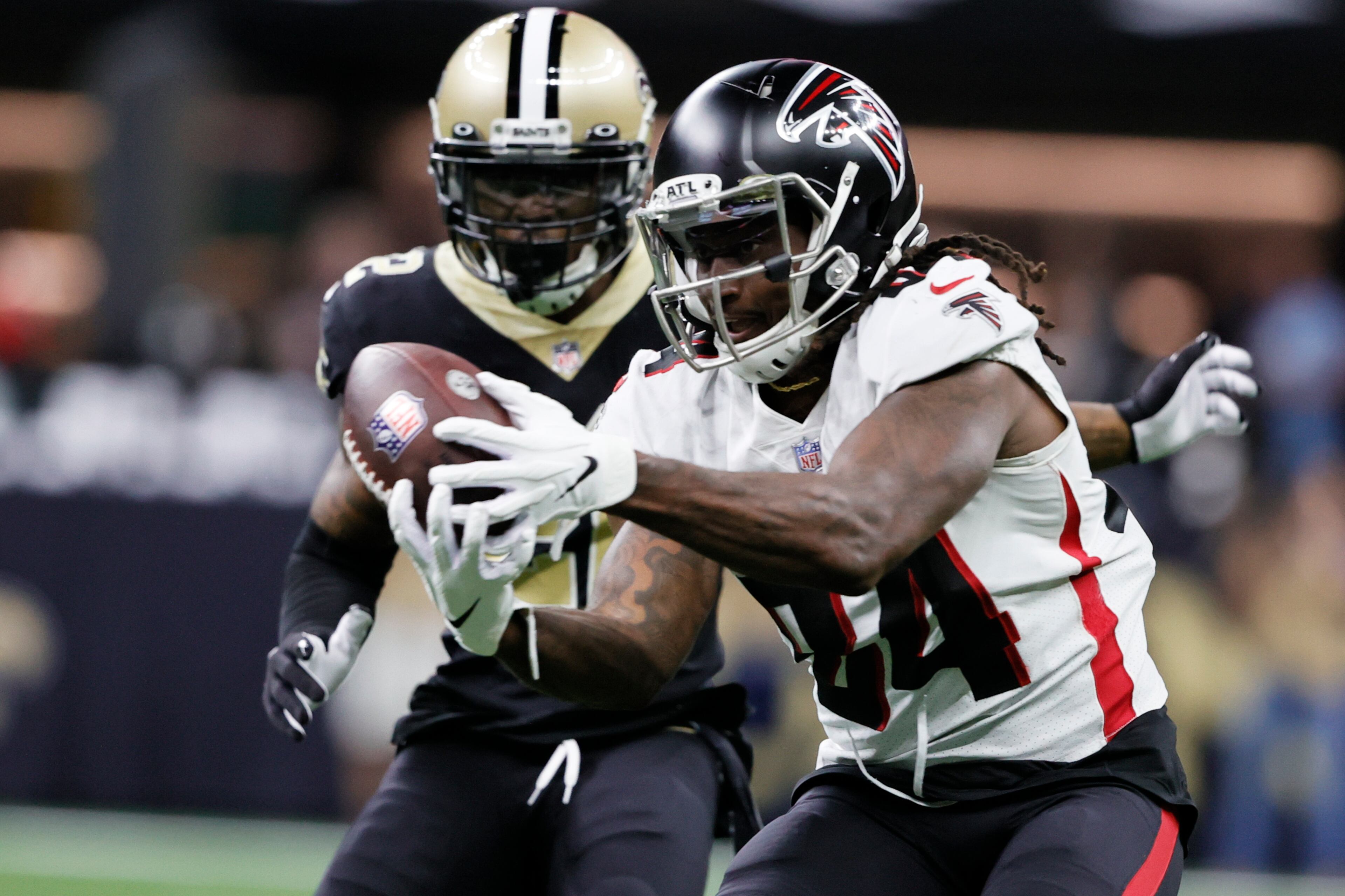 Atlanta Falcons running back Cordarrelle Patterson (84) makes the catch against New Orleans Saints defensive back Chauncey Gardner-Johnson (22) during the first half of an NFL football game, Sunday, Nov. 7, 2021, in New Orleans. (AP Photo/Butch Dill)