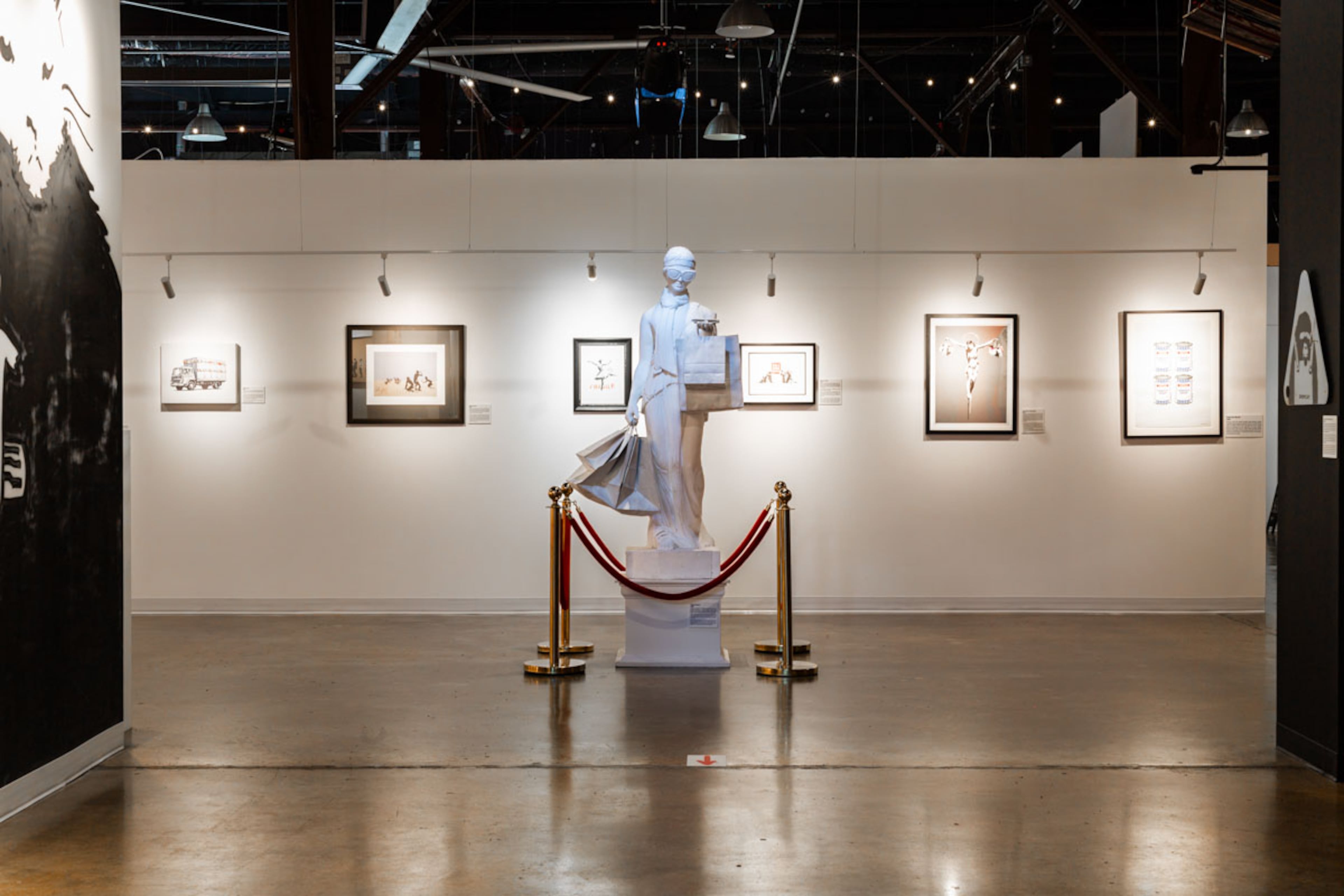 "The Art of Banksy: Without Limits" has raised questions over whether displaying the street artist's works on gallery walls negates his intention and meaning. (Courtesy of SEE Global Entertainment)