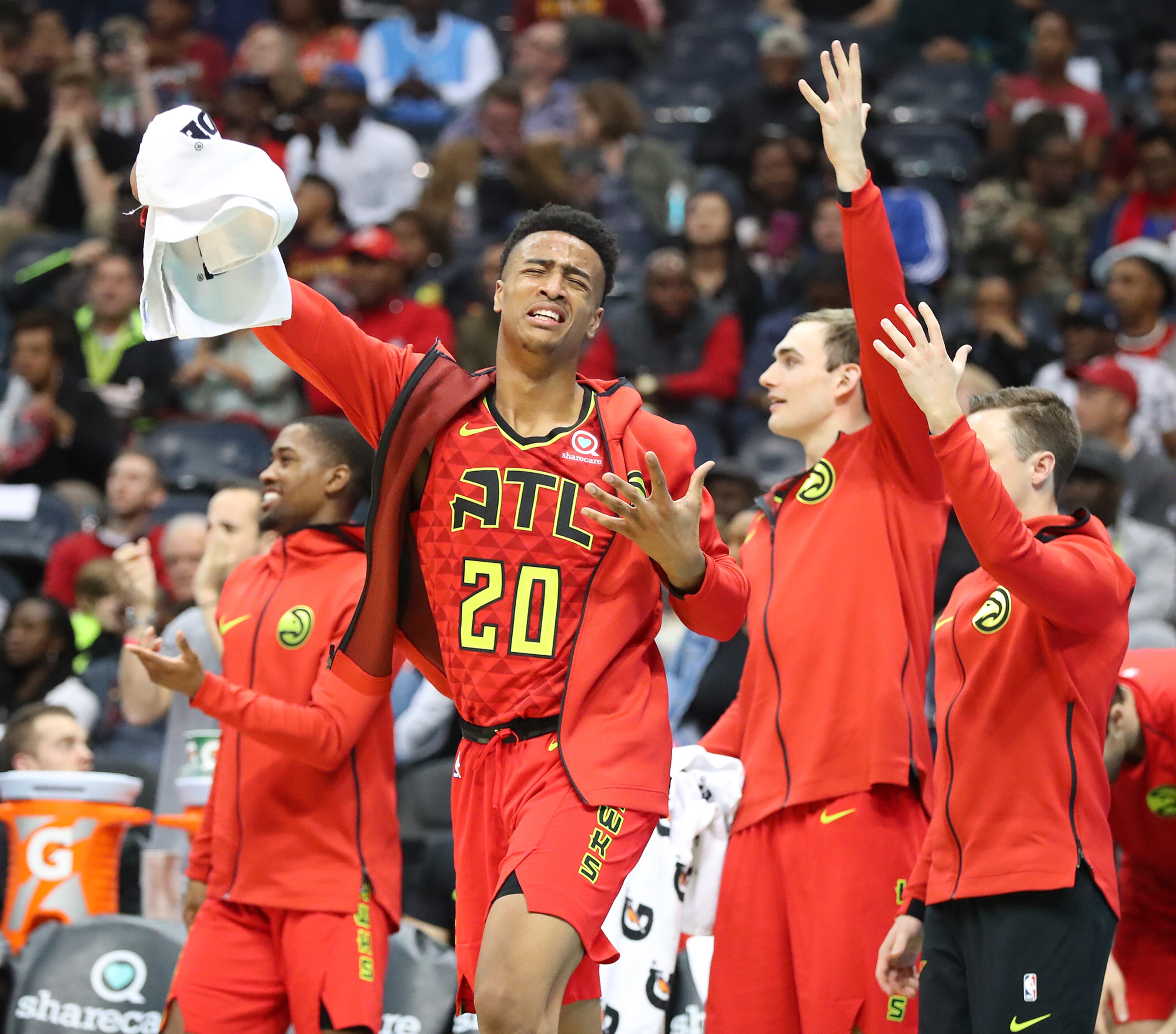 November 30, 2017 Atlanta: Hawks forward John Collins leads the cheers off the bench after Dennis Schroder hits a three against the Cavaliers in a NBA basketball game on Thursday, November 30, 2017, in Atlanta. Curtis Compton/ccompton@ajc.com