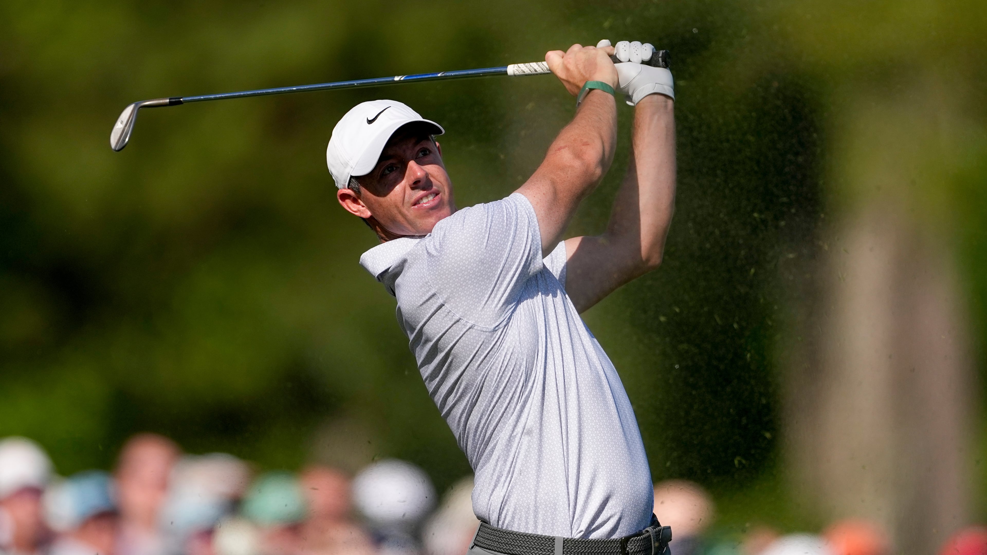 Rory McIlroy, of Northern Ireland, watches his tee shot on the 12th hole during the second round of the Masters golf tournament at the Augusta National Golf Club, Friday, April 10, 2026, in Augusta, Ga. (AP Photo/Eric Gay)