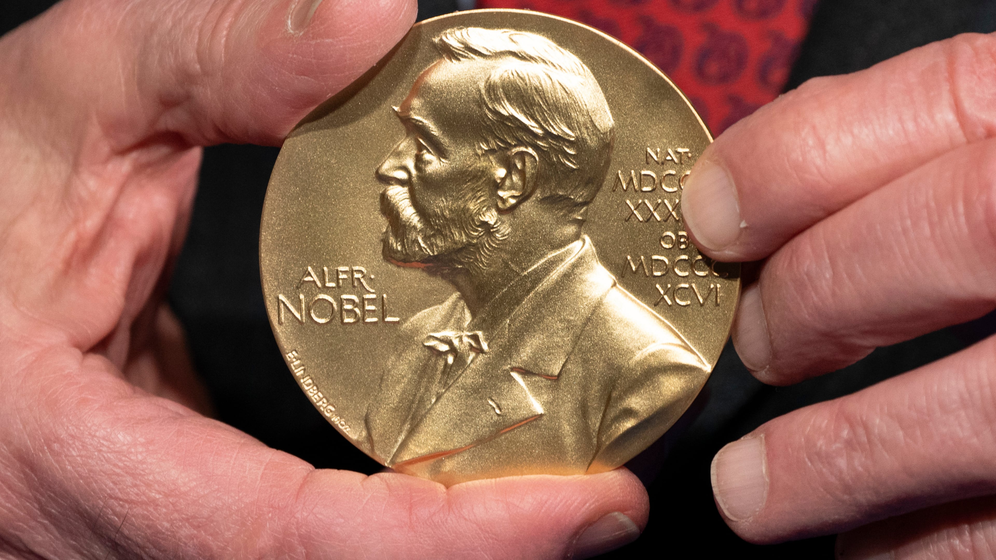 FILE - A close-up view of a Nobel Prize medal at the National Institutes of Health (NIH) in Bethesda, Md., Dec. 8, 2020. (AP Photo/Jacquelyn Martin, File)