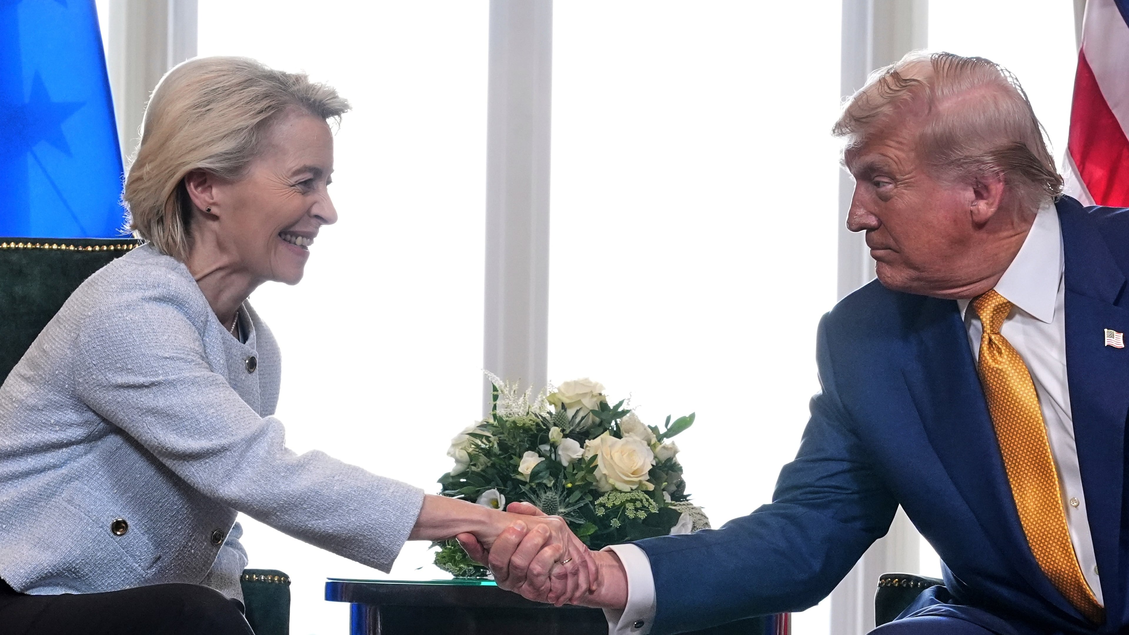 FILE - President Donald Trump and European Commission President Ursula von der Leyen shake hands after reaching a trade deal at the Trump Turnberry golf course in Turnberry, Scotland, on July 27, 2025. (AP Photo/Jacquelyn Martin, File)