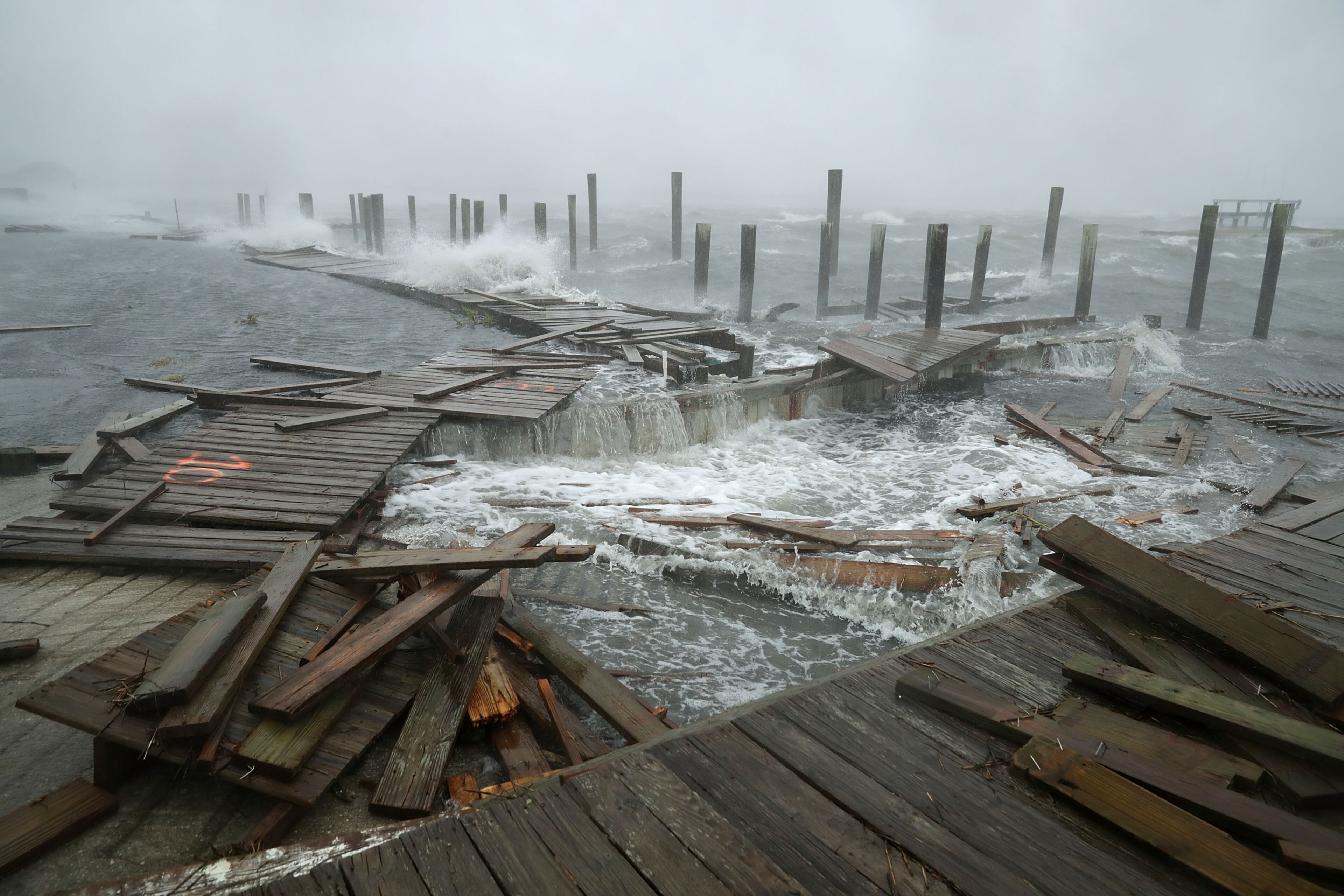 Portions of a boat dock and boardwalk are destroyed by powerful wind and waves as Hurricane Florence arriveed Thursday in Atlantic Beach, N.C. (Photo: Chip Somodevilla/Getty Images)