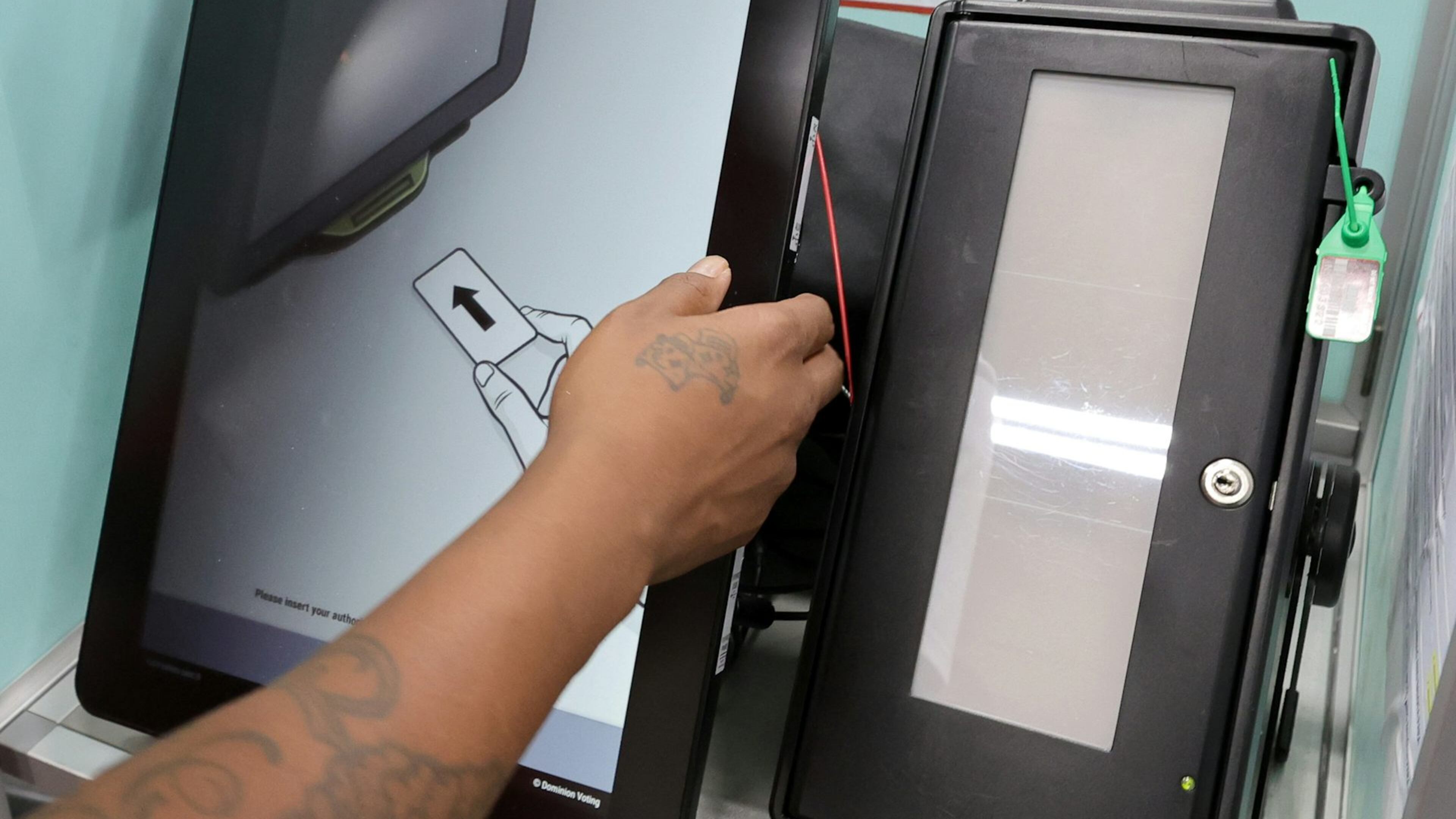 A voter casts a ballot with an electronic voting machine in a recent election. Just two decades ago, most people voted using mechanical levers or punch cards. Today, over 95% of ballots are counted electronically. In recent years, authoritarian regimes have refined a chillingly effective strategy to chip away at Americans’ faith in democracy by relentlessly sowing doubt about the tools U.S. states use to conduct elections. (Courtesy of The Conversation)