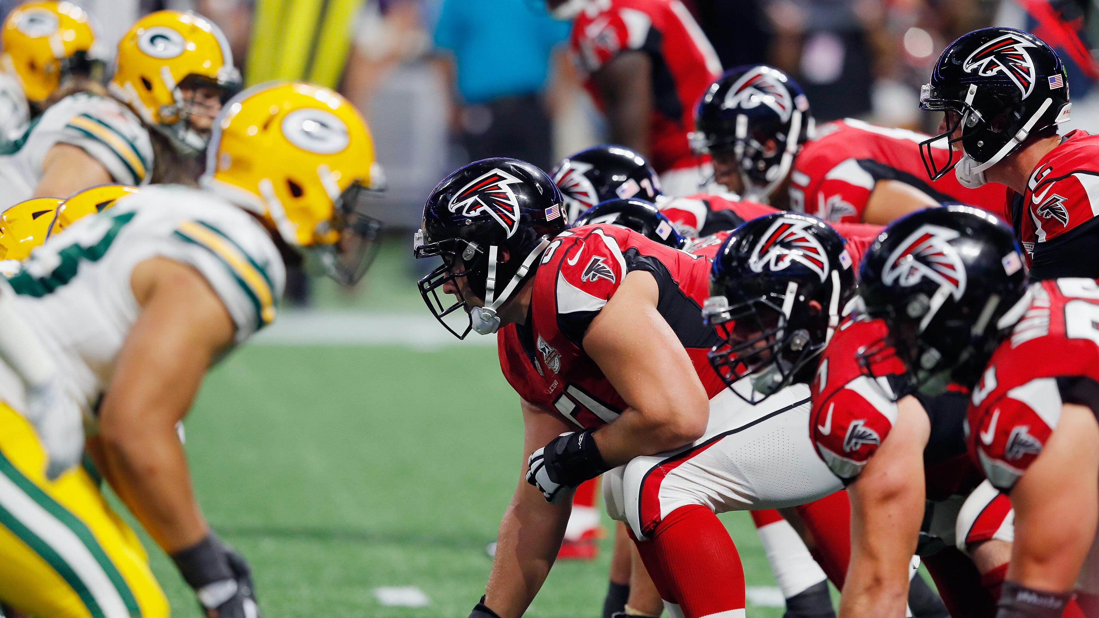 Falcons center Alex Mack #51 prepares to snap the ball during the second half against the Packers at Mercedes-Benz Stadium on September 17, in Atlanta