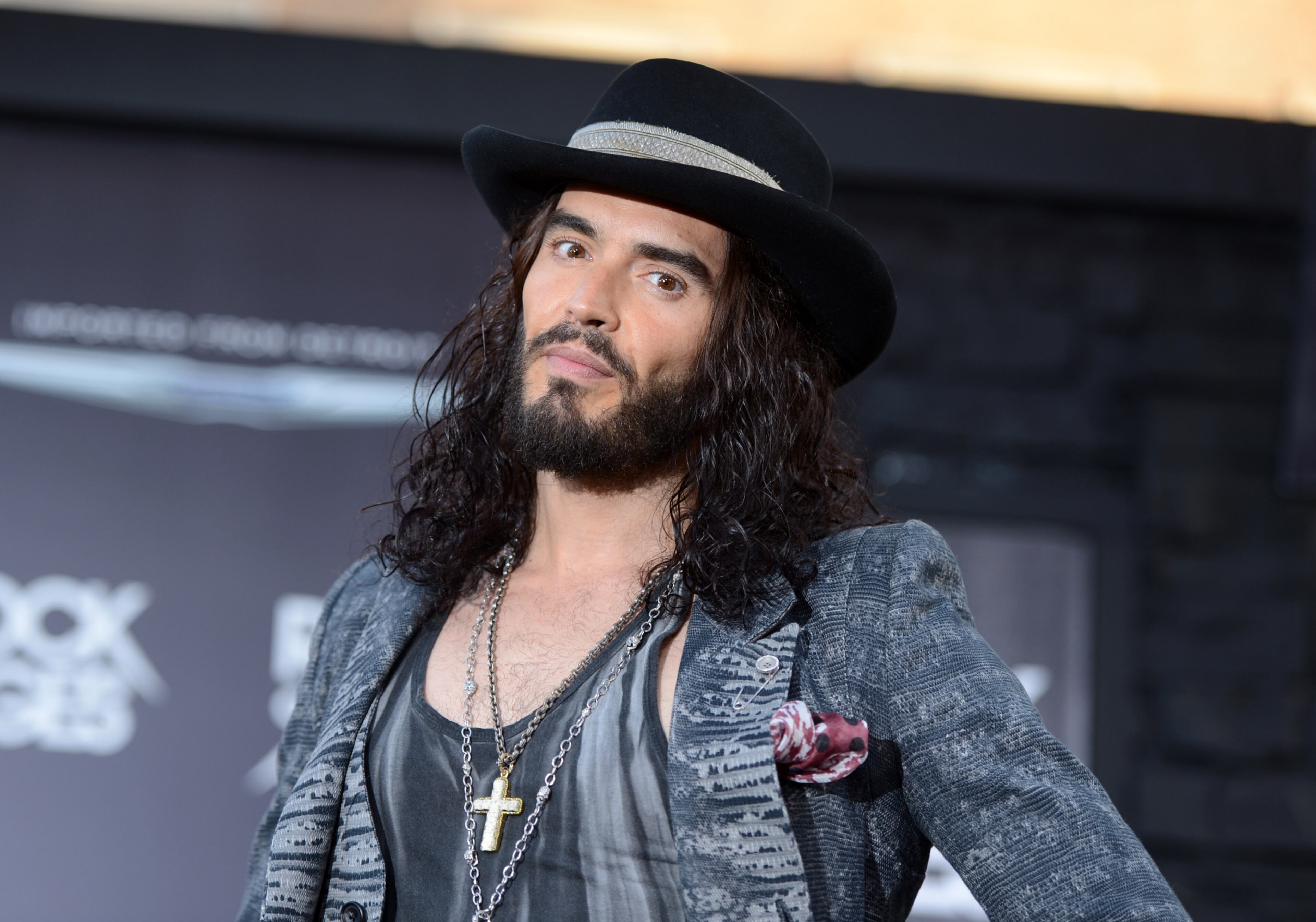 HOLLYWOOD, CA - JUNE 08: Actor Russell Brand arrives at the premiere of Warner Bros. Pictures' "Rock of Ages" at Grauman's Chinese Theatre on June 8, 2012 in Hollywood, California. (Photo by Kevin Winter/Getty Images)