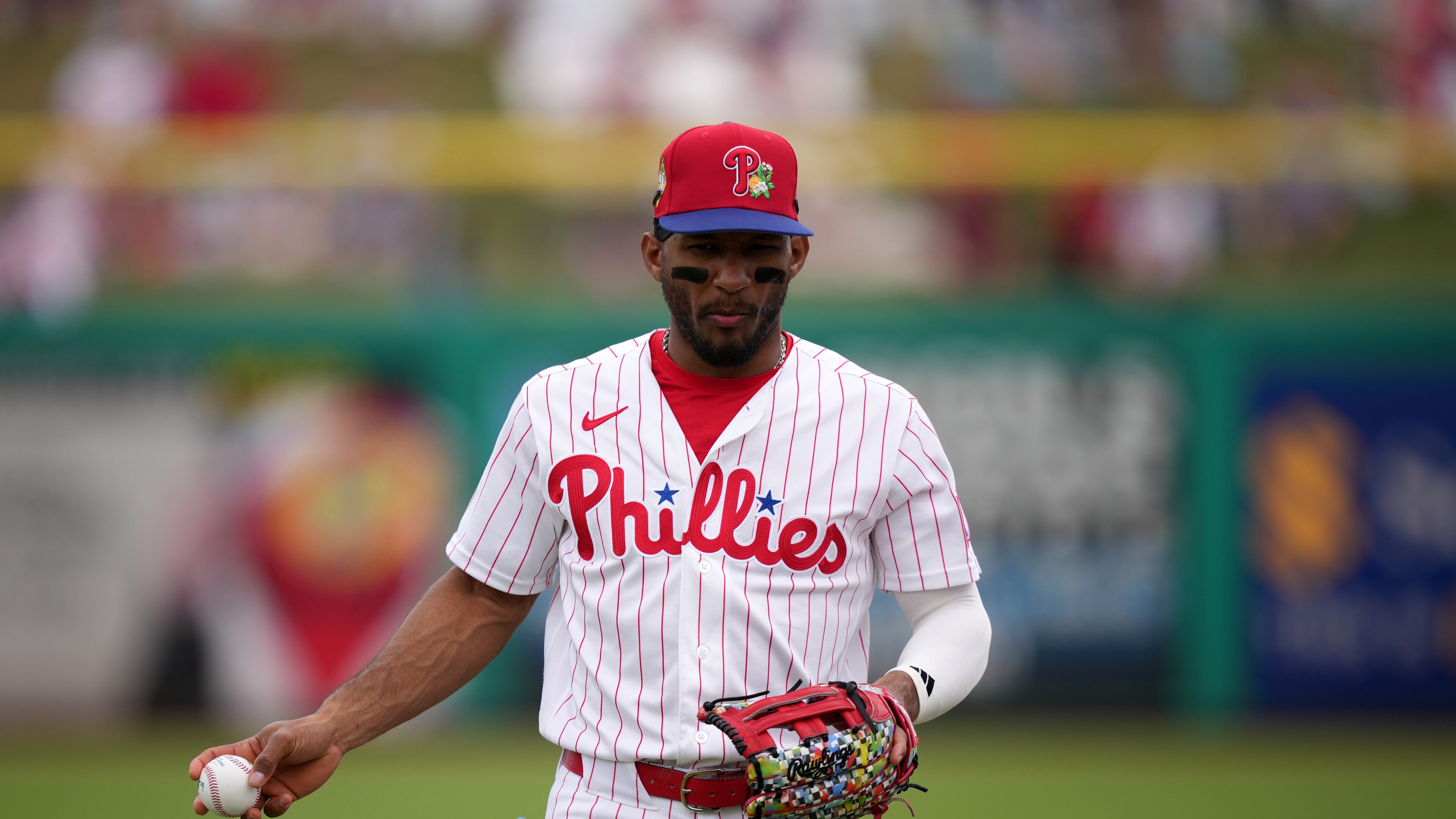 FILE - Philadelphia Phillies' Johan Rojas warms up before a spring training baseball game, Thursday, Feb. 26, 2026, in Clearwater, Fla. (AP Photo/Matt Slocum, File)