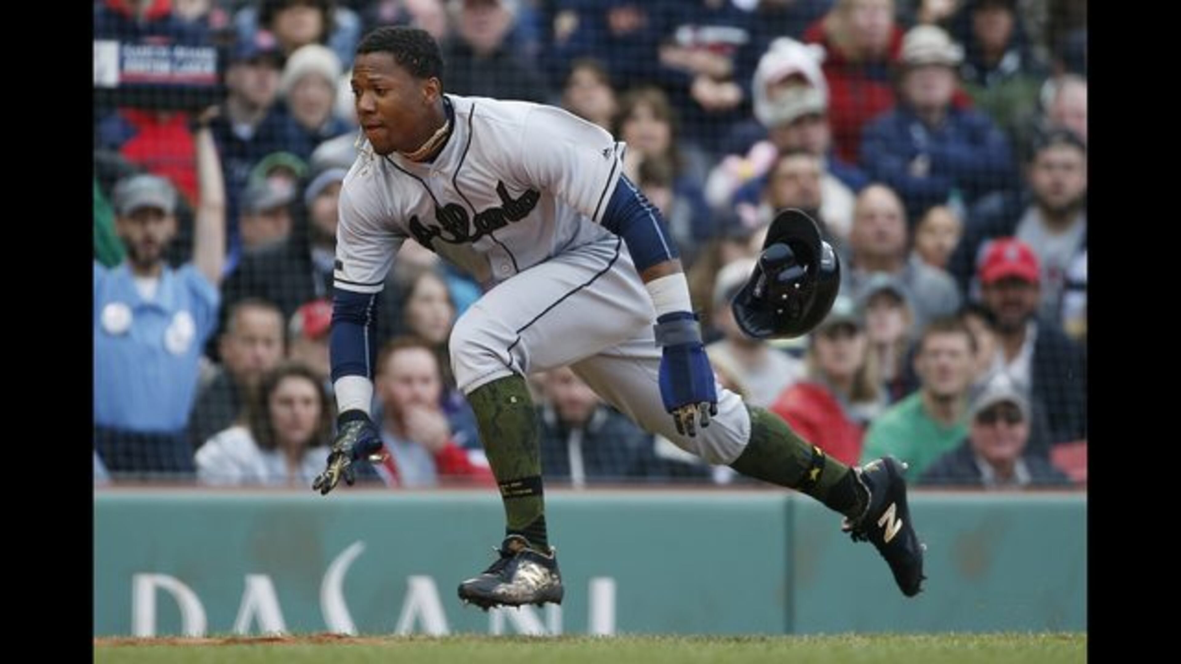 <p> Team personnel help Atlanta Braves' Ronald Acuna Jr. after he was injured while running out a single during the seventh inning of an interleague baseball game against the Boston Red Sox, Sunday, May 27, 2018, in Boston. (AP Photo/Michael Dwyer) </p> <p> Atlanta Braves' Ronald Acuna Jr. begins to slide as he scores on a two-run double by Freddie Freeman during the fifth inning of an interleague baseball game against the Boston Red Sox, Sunday, May 27, 2018, in Boston. (AP Photo/Michael Dwyer) </p> <p> Atlanta Braves' Ronald Acuna Jr., left, scores on a two-run double by Freddie Freeman as Boston Red Sox's Sandy Leon gets the throw during the fifth inning of an interleague baseball game, Sunday, May 27, 2018, in Boston. (AP Photo/Michael Dwyer) </p>