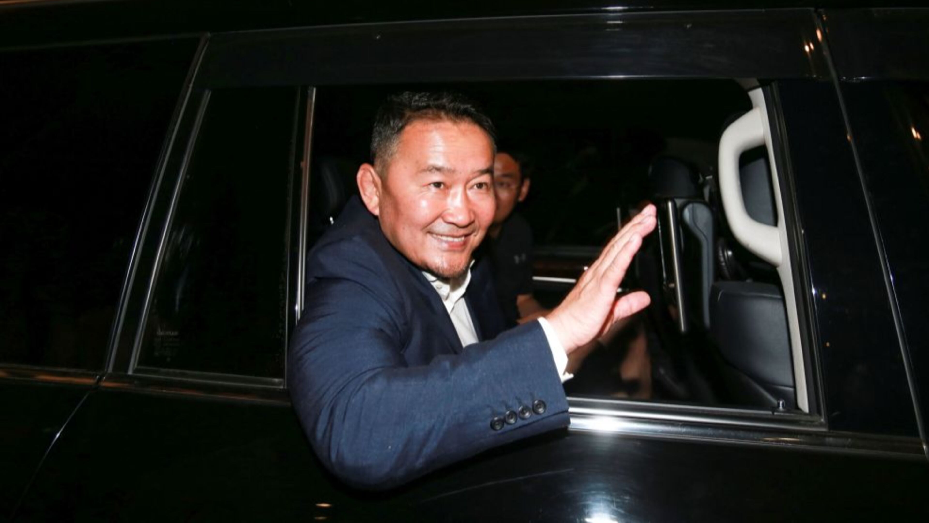 Khaltmaa Battulga waves to the crowd after he won Mongolia's presidential election.