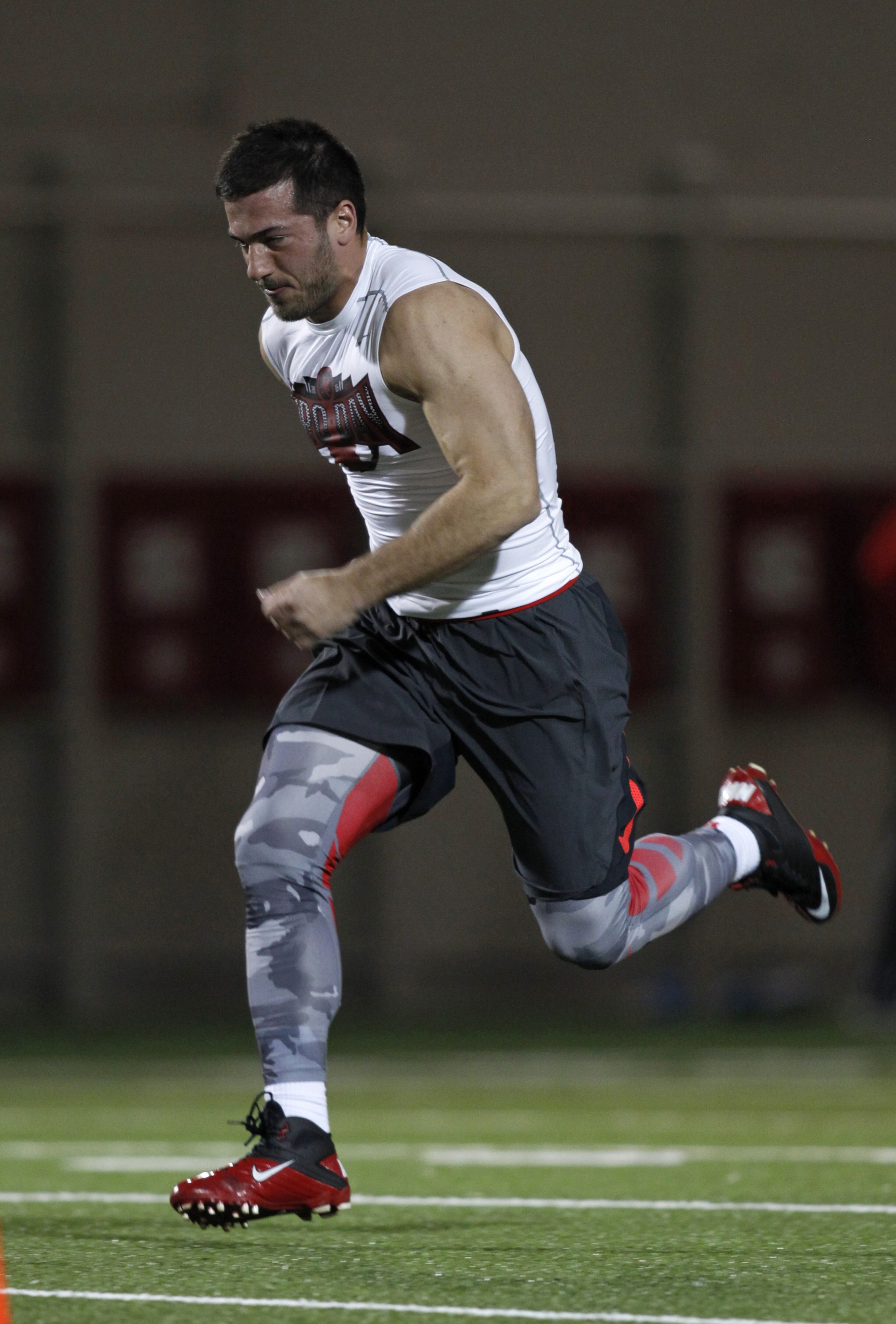 Long snapper George Makridis runs a drill during NFL Pro Day at Ohio State University in Columbus, Ohio, Friday, March 13, 2015. (AP Photo/Paul Vernon)