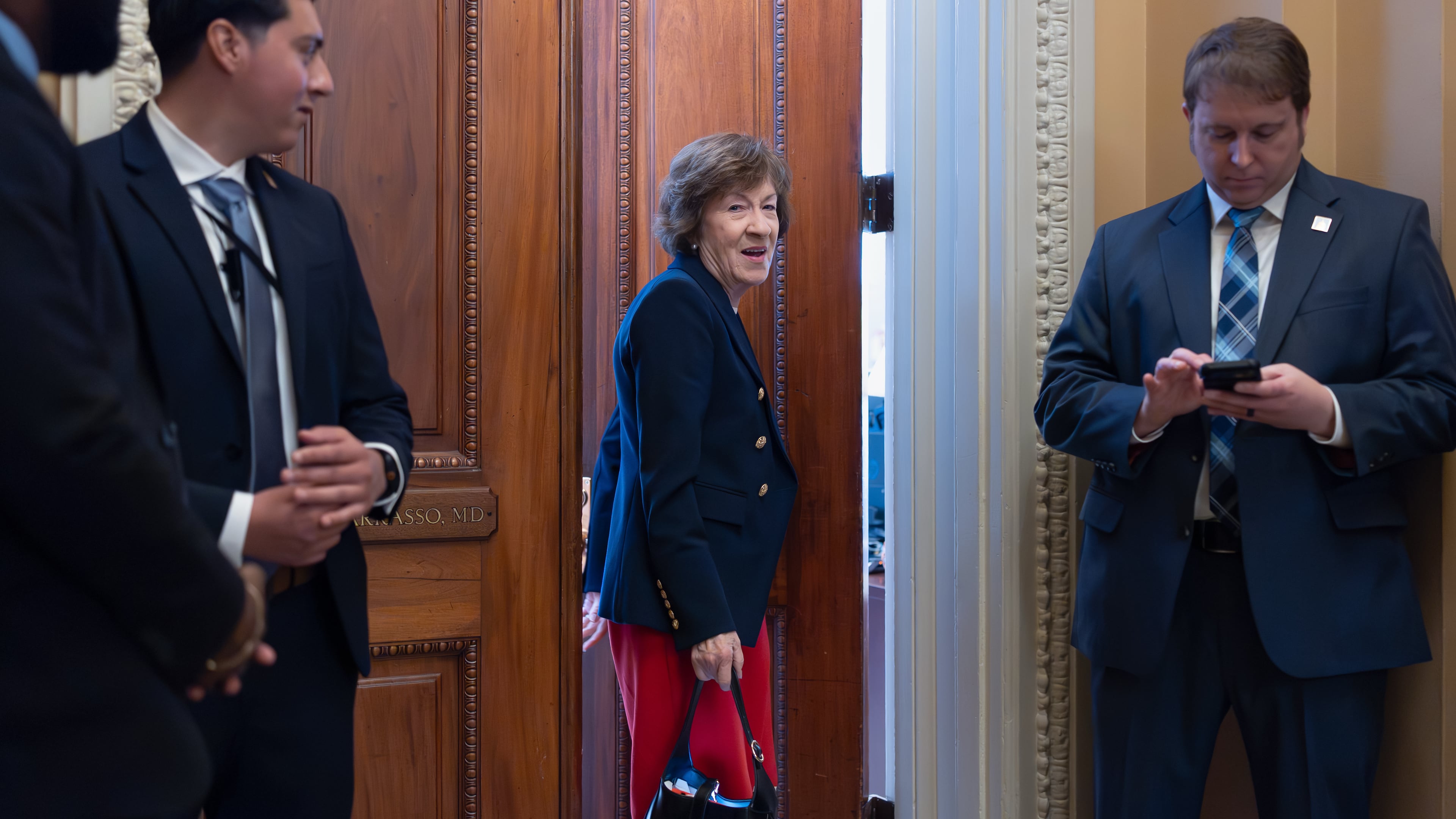 Sen. Susan Collins, R-Maine, chair of the Senate Appropriations Committee, heads to the chamber before votes on the immigration enforcement funding package, at the Capitol in Washington, Thursday, June 4, 2026. (AP Photo/J. Scott Applewhite)