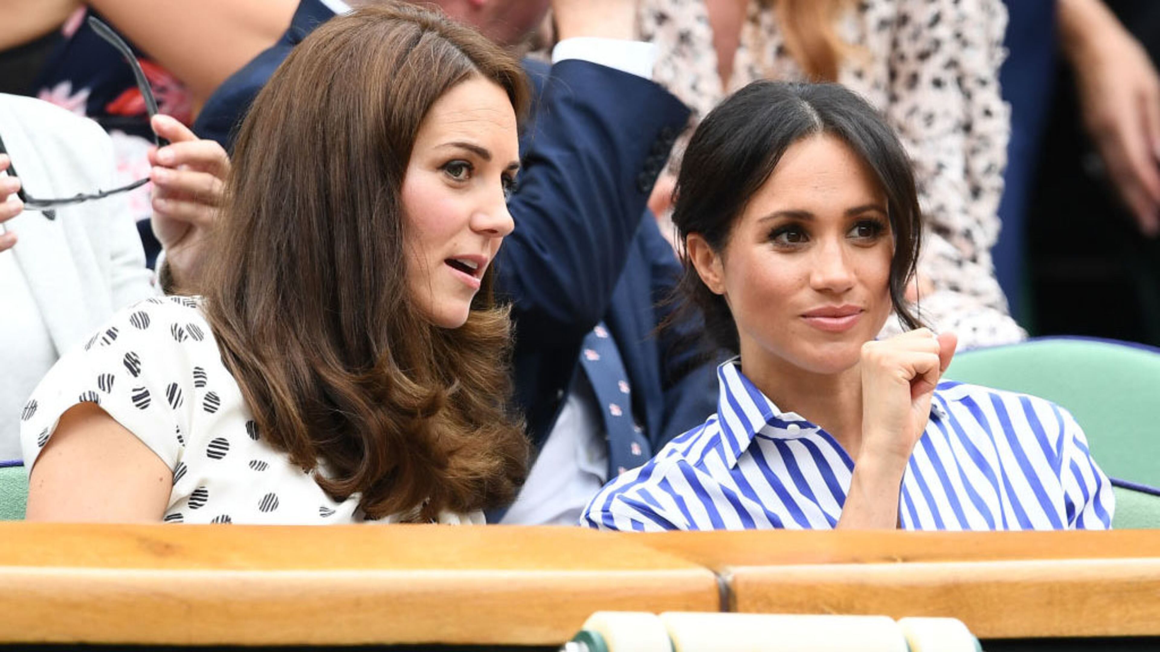 LONDON, ENGLAND - JULY 14: Catherine, Duchess of Cambridge and Meghan, Duchess of Sussex attend day twelve of the Wimbledon Lawn Tennis Championships at All England Lawn Tennis and Croquet Club on July 14, 2018 in London, England. (Photo by Clive Mason/Getty Images)