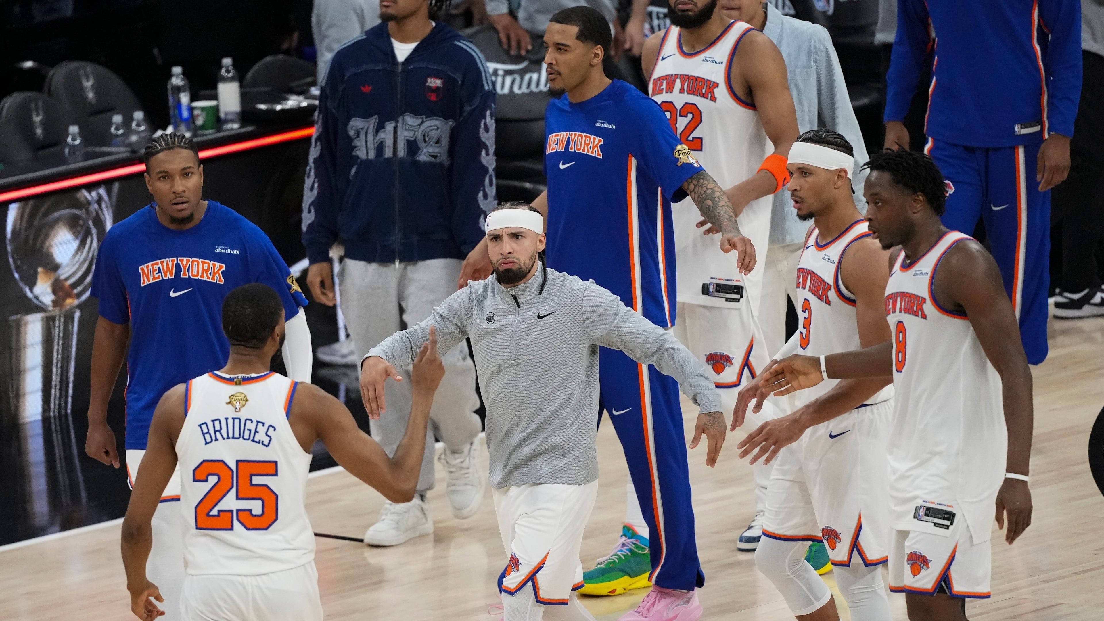 The New York Knicks celebrate after Game 1 of the NBA Finals basketball series against the San Antonio Spurs, Wednesday, June 3, 2026, in San Antonio. (AP Photo/Eric Gay)