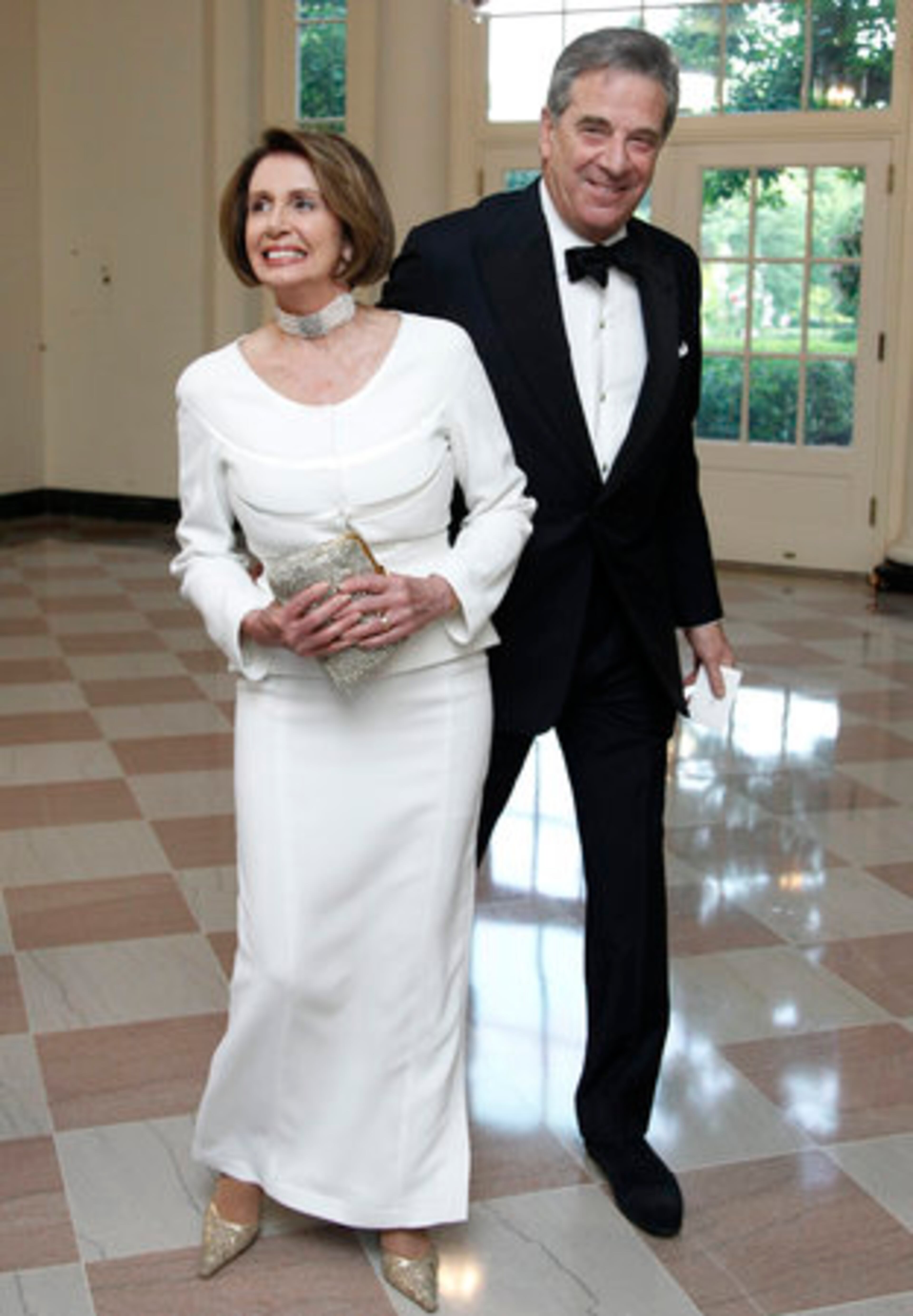 House Democratic Leader Nancy Pelosi, D-Calif., and her husband Paul Pelosi arrive for the dinner.