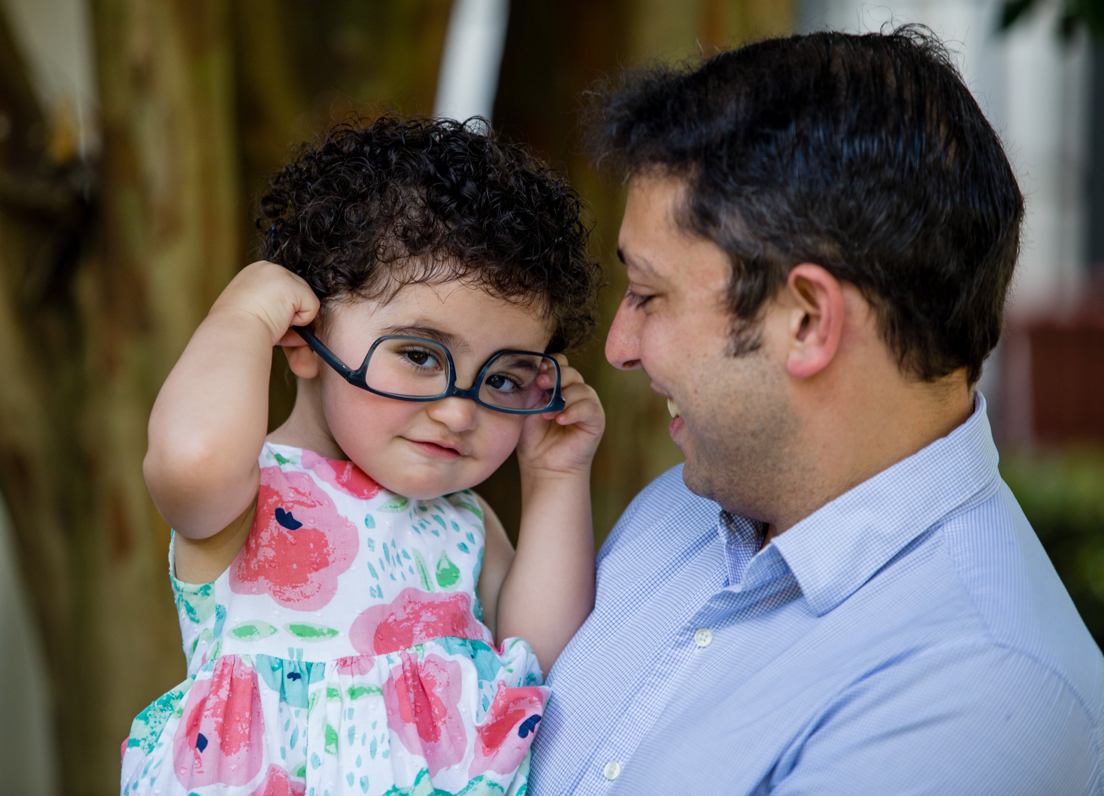 Jonathan Gregg with his daughter, Simone Mize-Gregg, who was recently declared a U.S. citizen by a U.S. district court judge. (Jenni Girtman for The Atlanta Journal-Constitution)