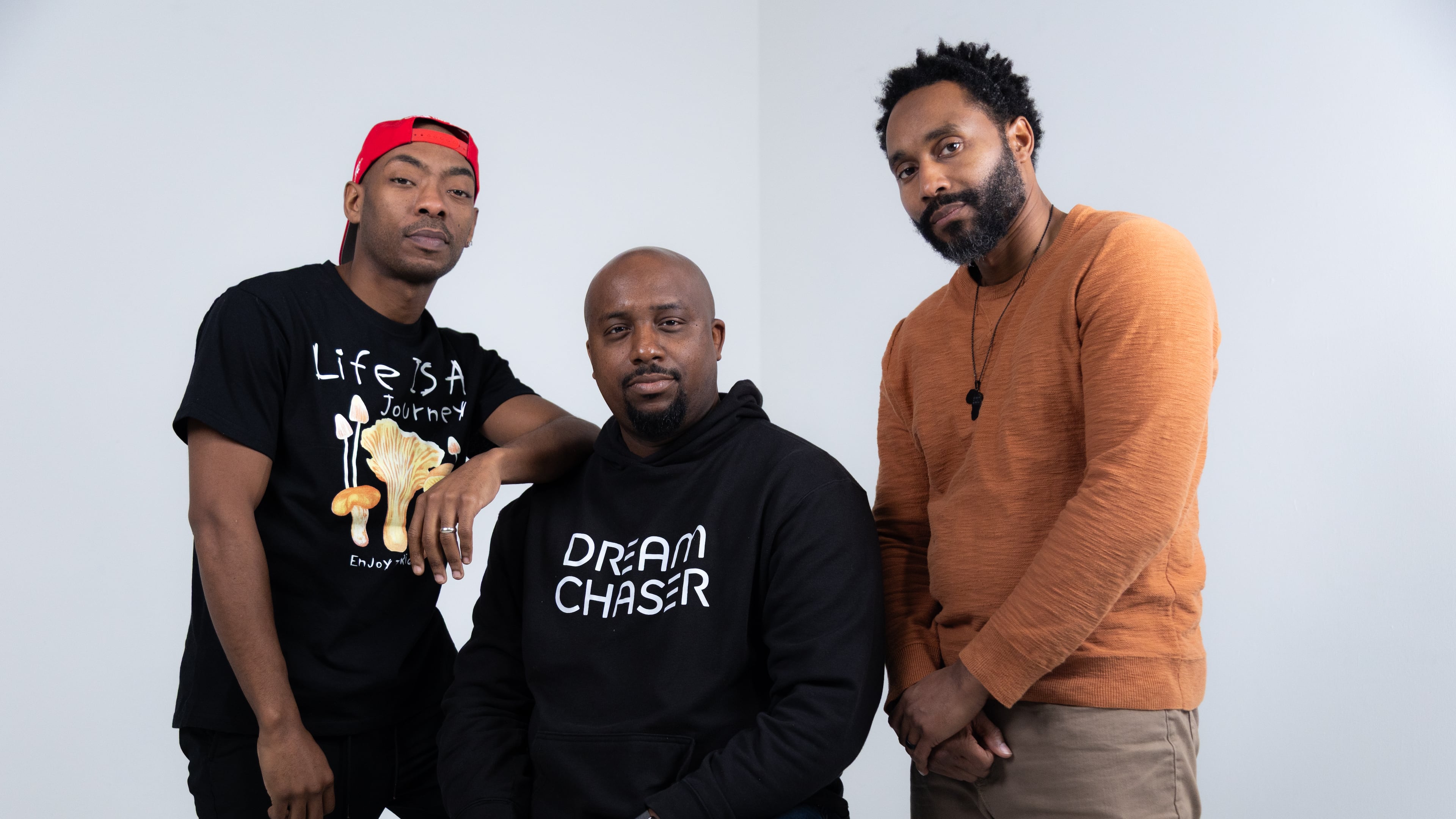 'Topdog/Underdog' actors Lamar K. Cheston, left, and Aaron Goodson, far right, with director Eric J. Little, center. The 2023 Tony Award winner for Best Play Revival, the Suzan-Lori Parks drama focuses on two loving yet competitive brothers who are struggling with the cards that life and fate has dealt them.