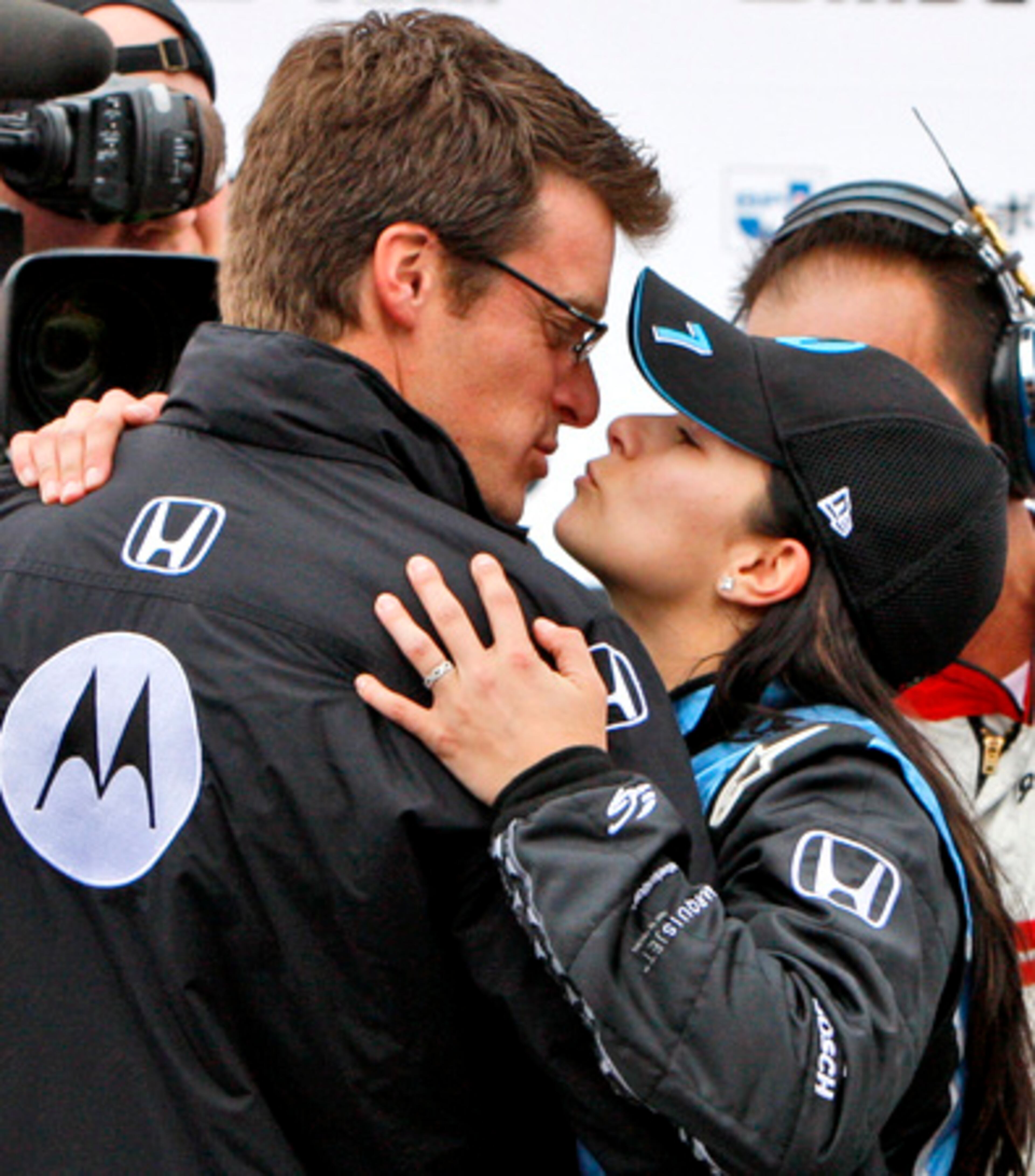 Patrick's husband, Paul Hospenthal, was ready with a kiss after her historic win.
