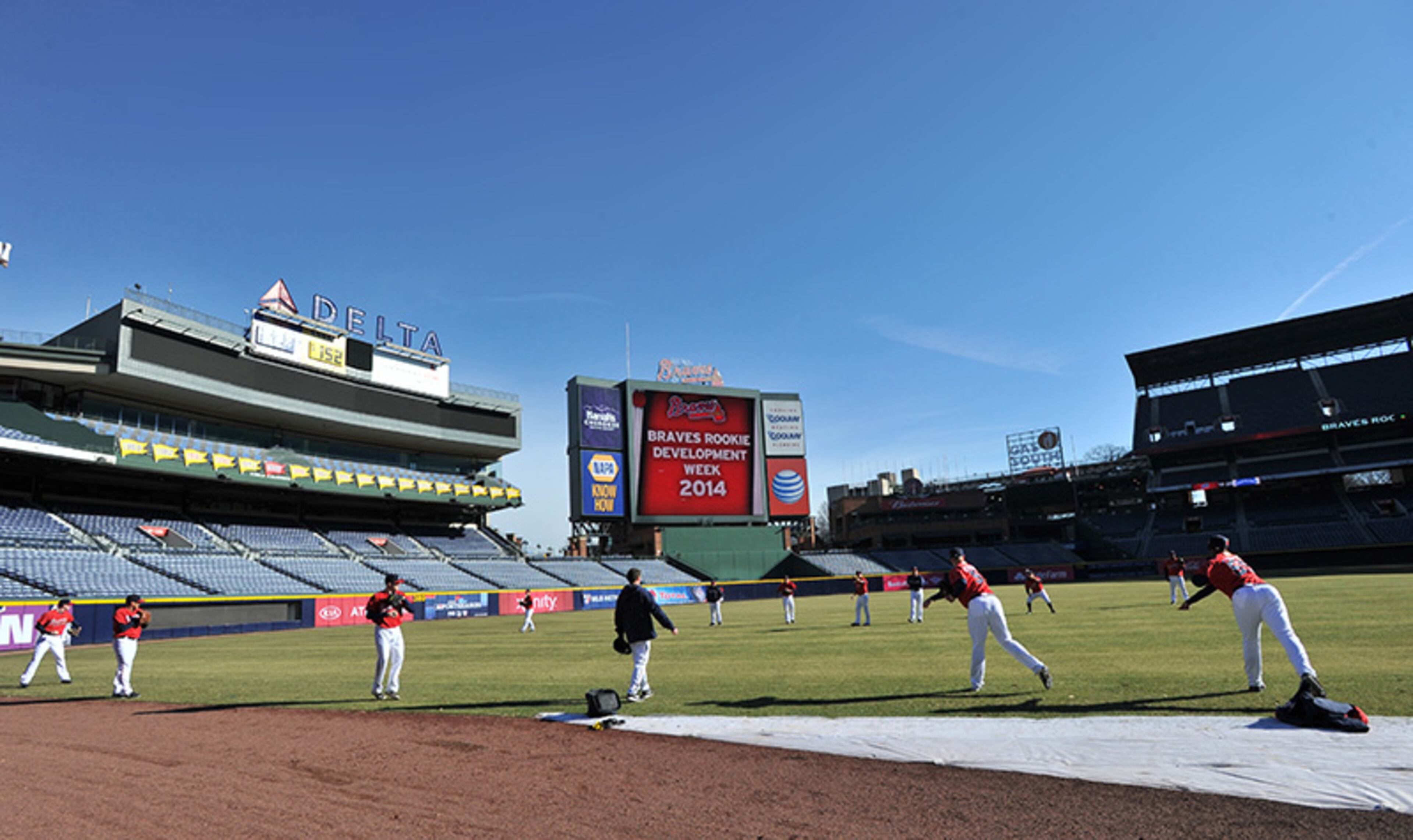 Atlanta Braves rookie pitchers take part in field warmups on the Turner Field turf.