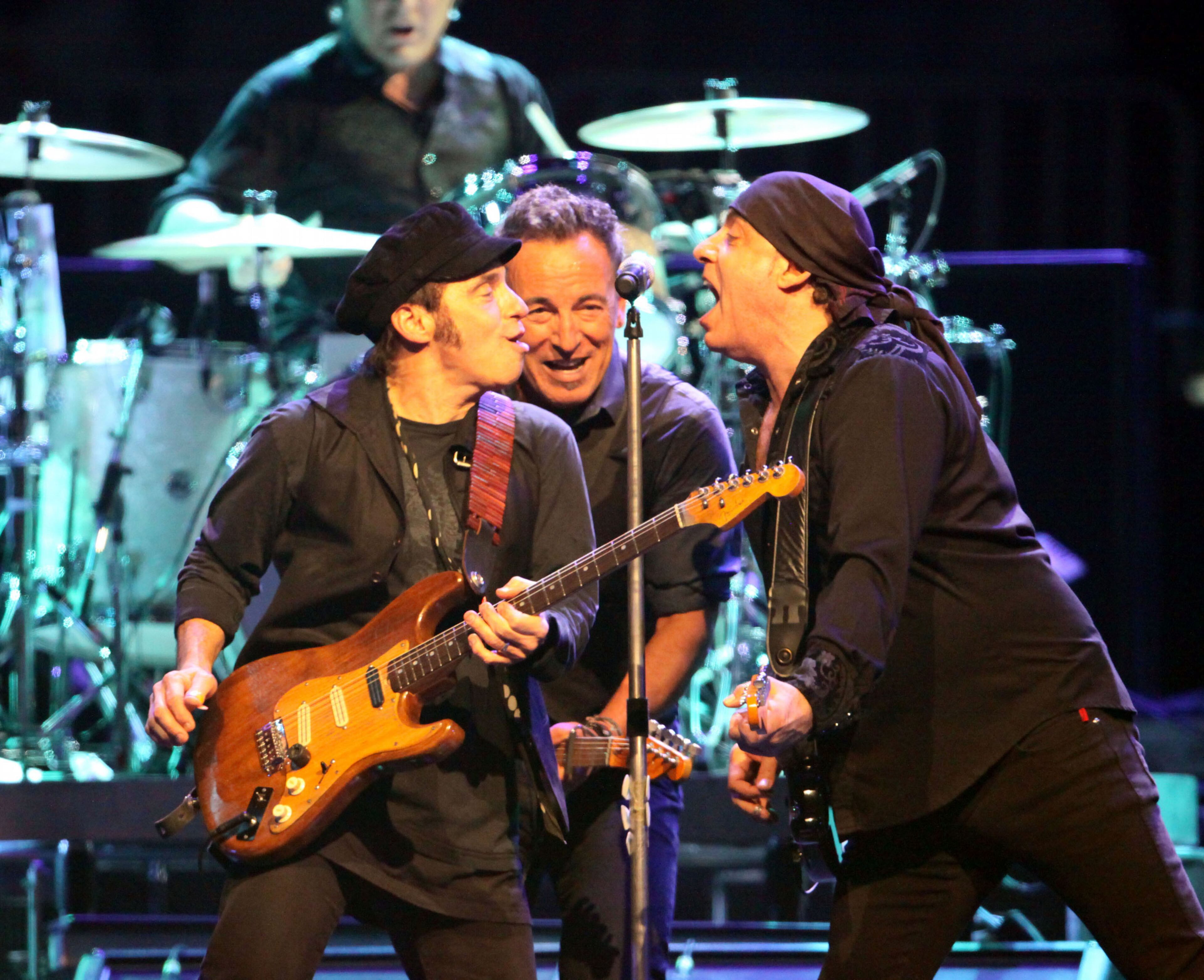 E Street Band members Nils Lofgren (left), Springsteen (center) and Steven Van Zandt during the Atlanta show.