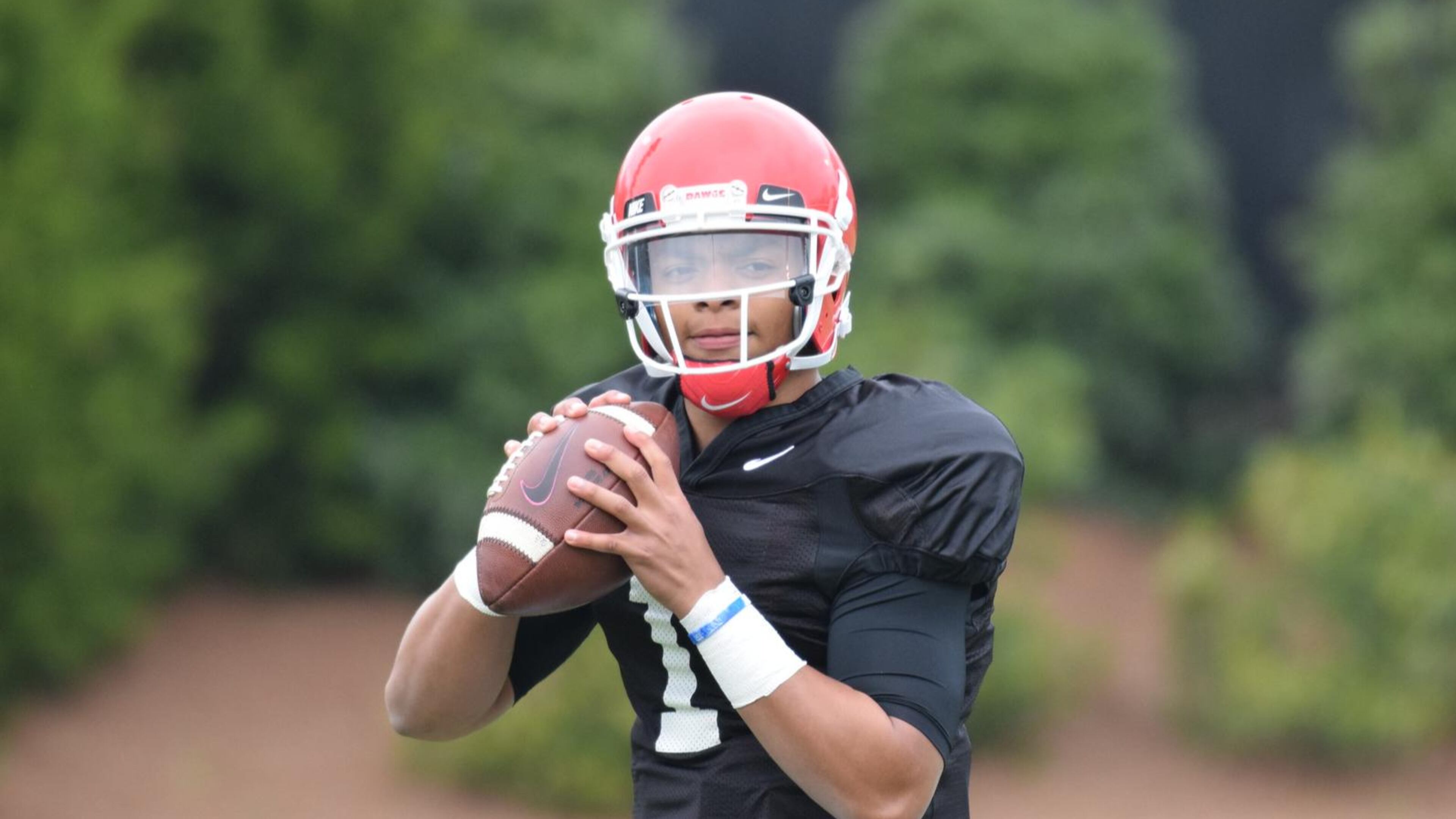 Georgia quarterback Justin Fields (1) during the Bulldogs' practice on the Woodruff Practice Fields in Athens, Ga., on Tuesday, March 27, 2018. (Photo by Steven Colquitt / UGA Athletic Department)