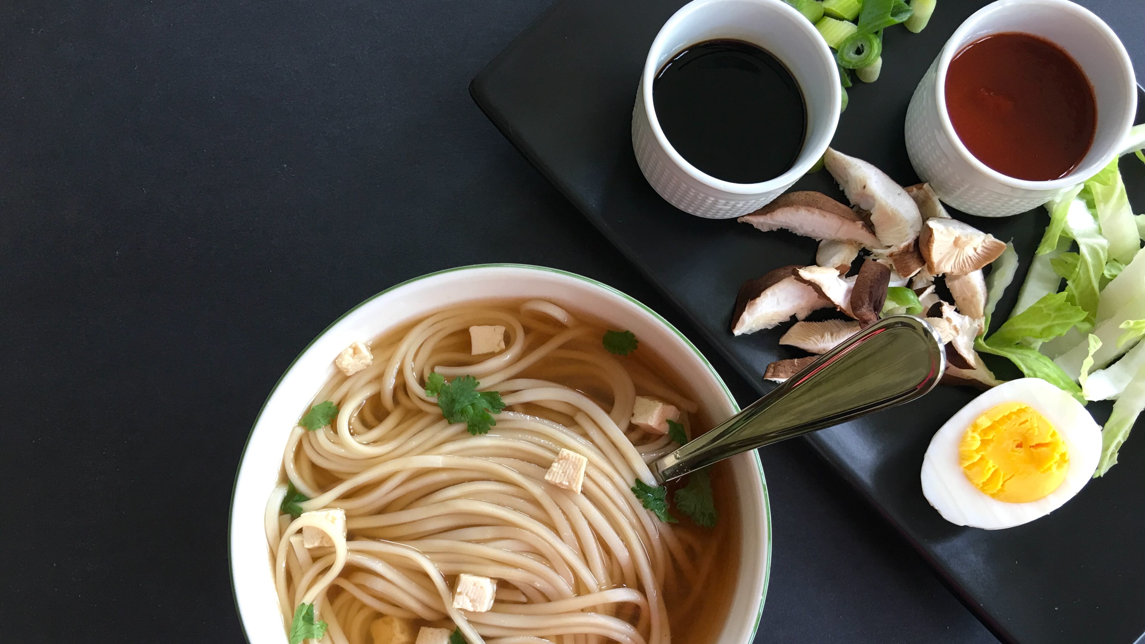 Customize bowls of savory broth with your favorite ingredients to make a satisfying Asian Noodle Soup. (Kellie Hynes for the AJC)