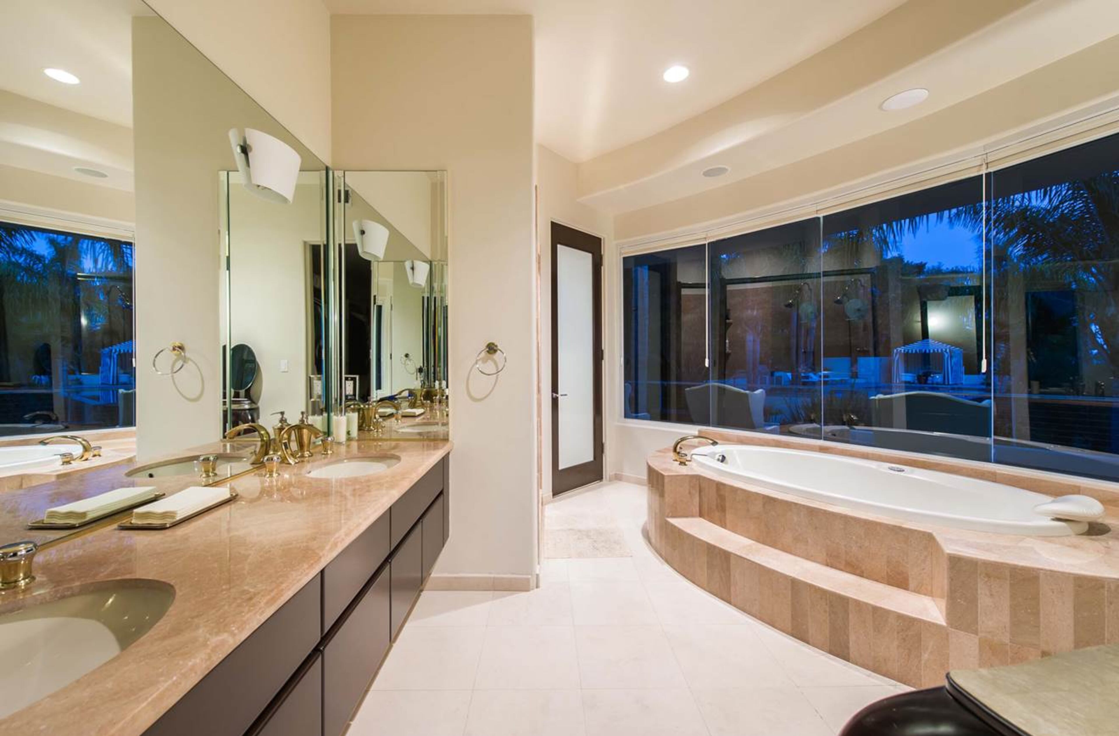 Dexter King has put his 4-bedroom, 6-bath Malibu mansion up for sale with an asking price of $4,850,000. The 6,823 square-foot home sits on a property that's over and acre, and includes 15 fruit trees. The main house includes a chef's kitchen, formal dining area, theatre, elevator, home office and full gym. Outdoor features include a cabana, koi pond, waterfall spa and bbq. (Marc Angeles)