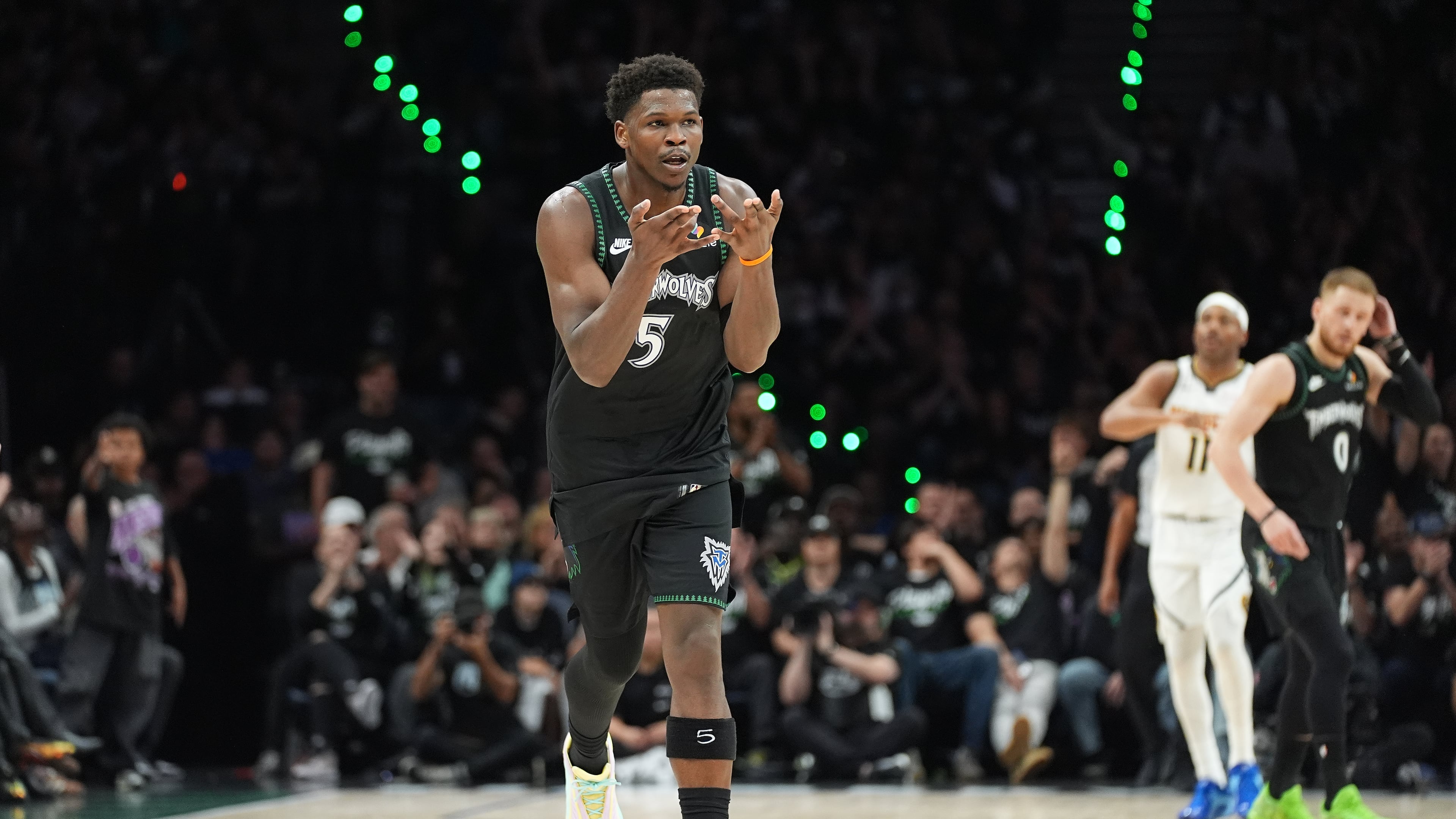 Minnesota Timberwolves guard Anthony Edwards (5) celebrates after making a 3-point shot during the first half in Game 3 of a first-round NBA basketball playoff series against the Denver Nuggets, Thursday, April 23, 2026, in Minneapolis. (AP Photo/Abbie Parr)