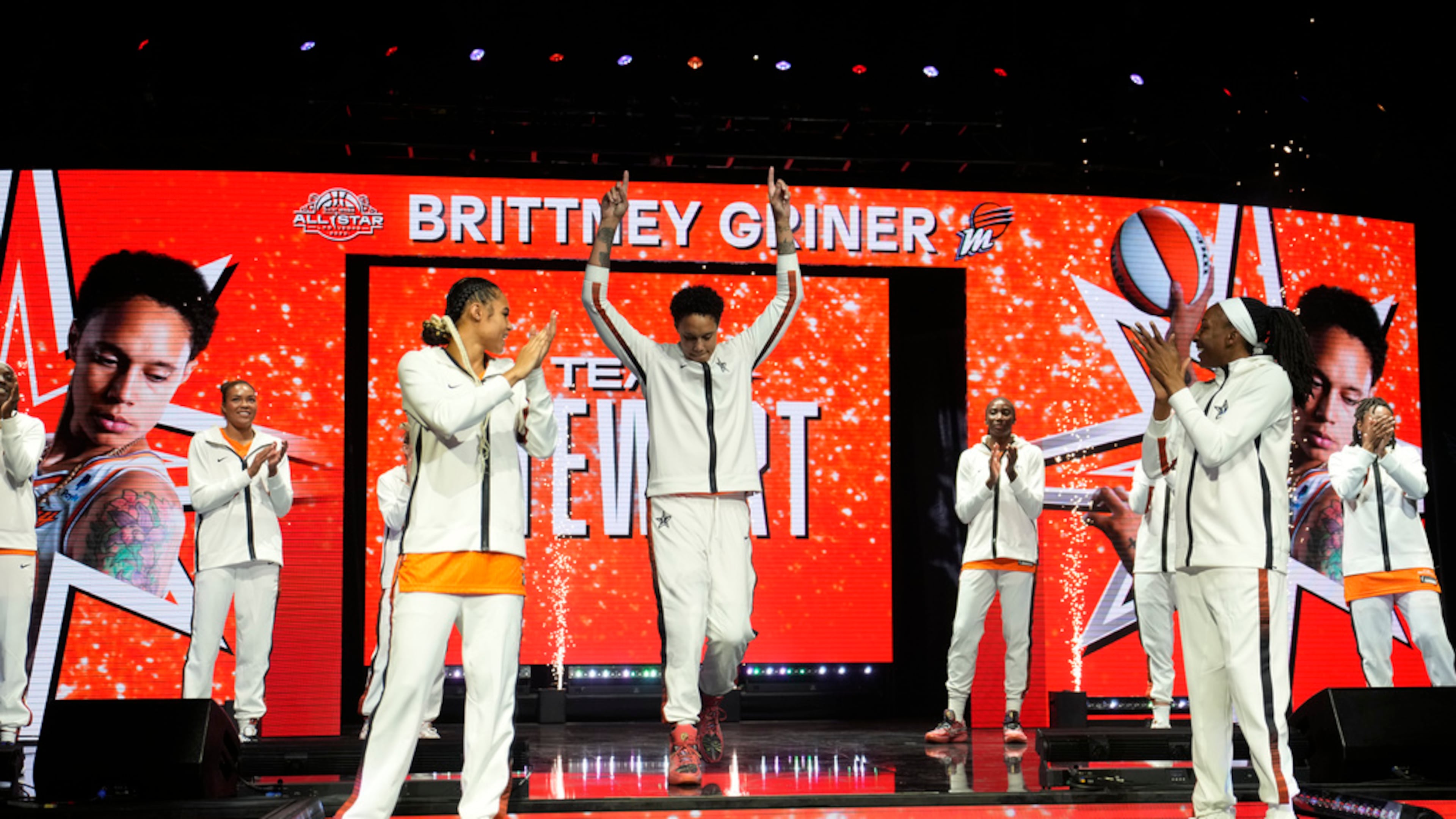 Phoenix Mercury's Brittney Griner, of Team Stewart, center, reacts as she is introduced before a WNBA All-Star basketball game Saturday, July 15, 2023, in Las Vegas. (AP Photo/John Locher)