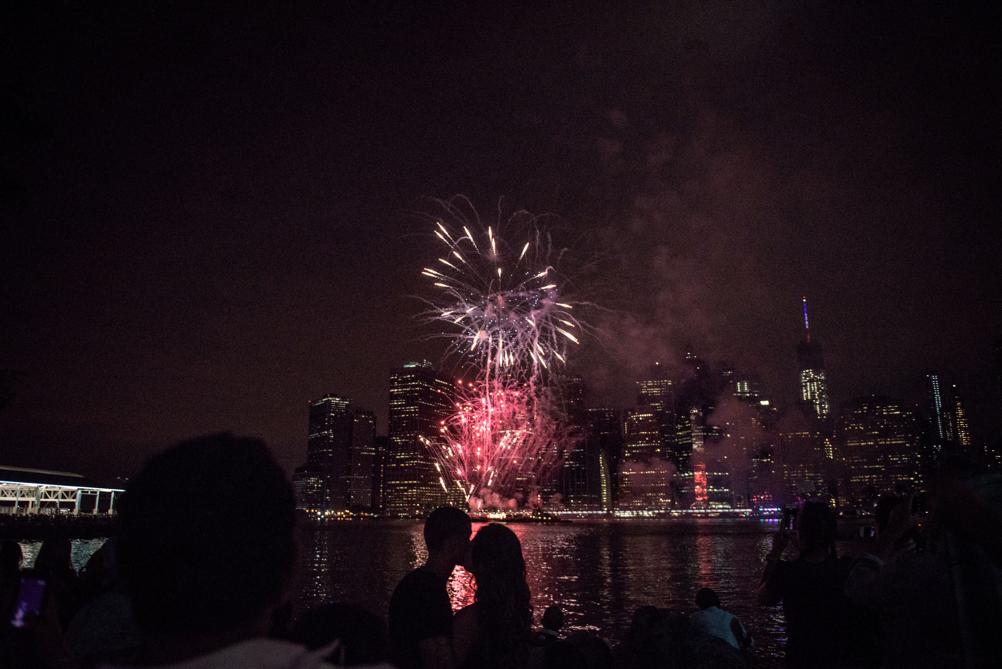NEW YORK, NY - JULY 4: People watch Macy's Fourth of July Fireworks from Brooklyn Bridge Park on July 4, 2015 in the Brooklyn borough of New York City. The celebrations mark the nation's 239th Independence Day. (Photo by Andrew Renneisen/Getty Images)