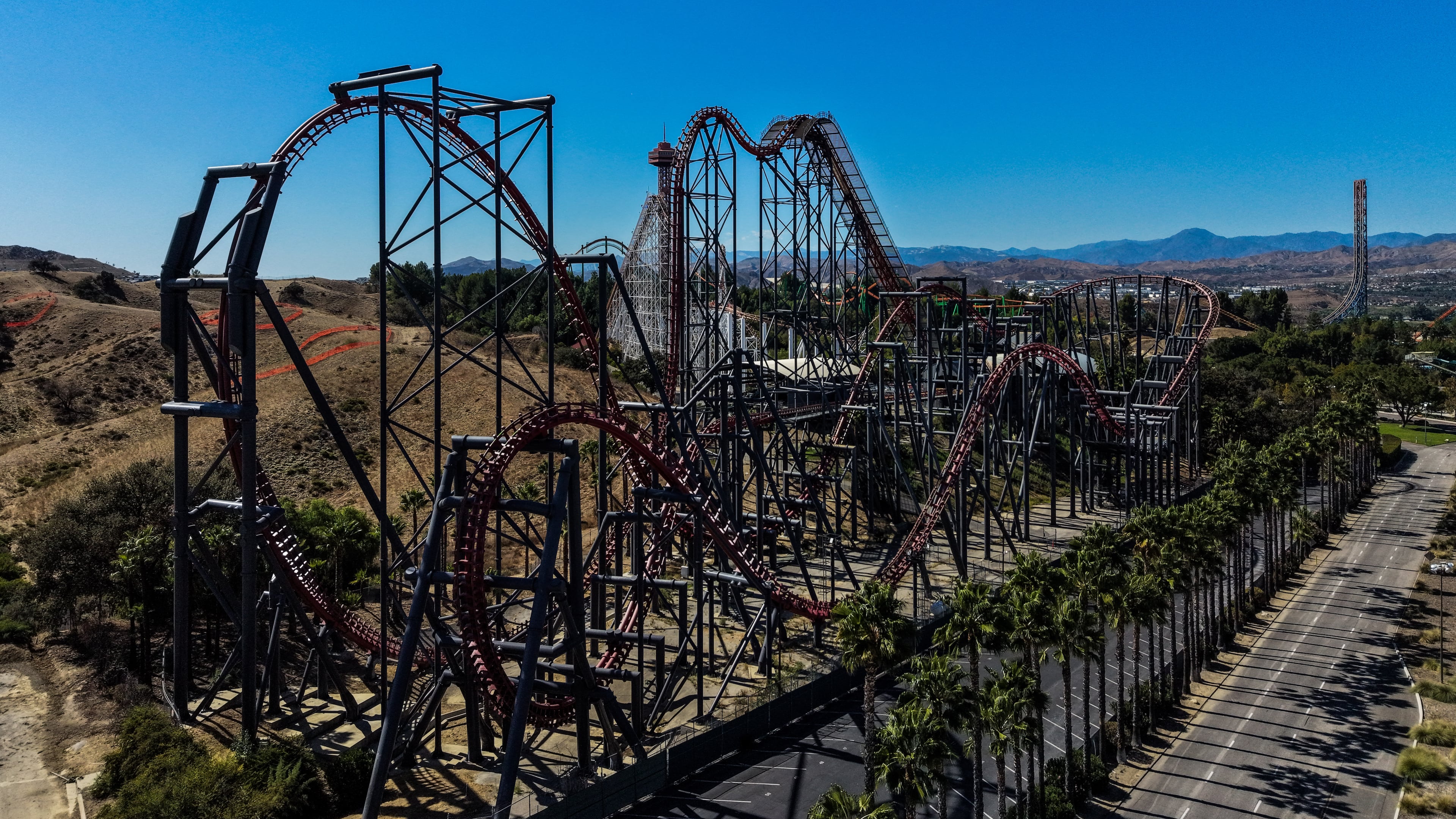 This aerial view shows the X2 roller coaster at Six Flags Magic Mountain in Valencia, Calif., Wednesday, Sept. 23, 2026. (AP Photo/Jae C. Hong)