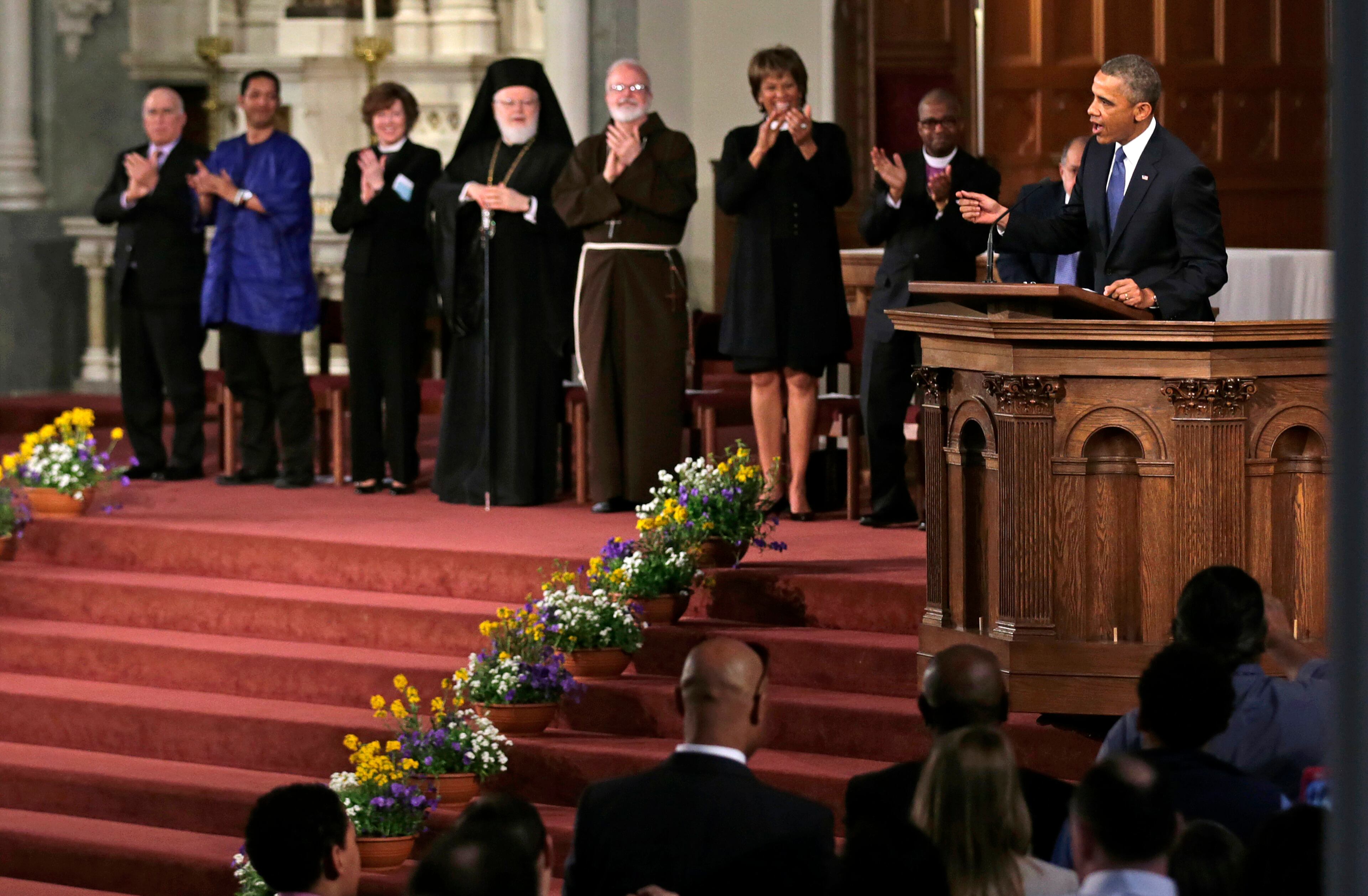 President Barack Obama speaks during an interfaith healing service at the Cathedral of the Holy Cross in Boston on April 18, 2013, for victims of Monday's Boston Marathon explosions.