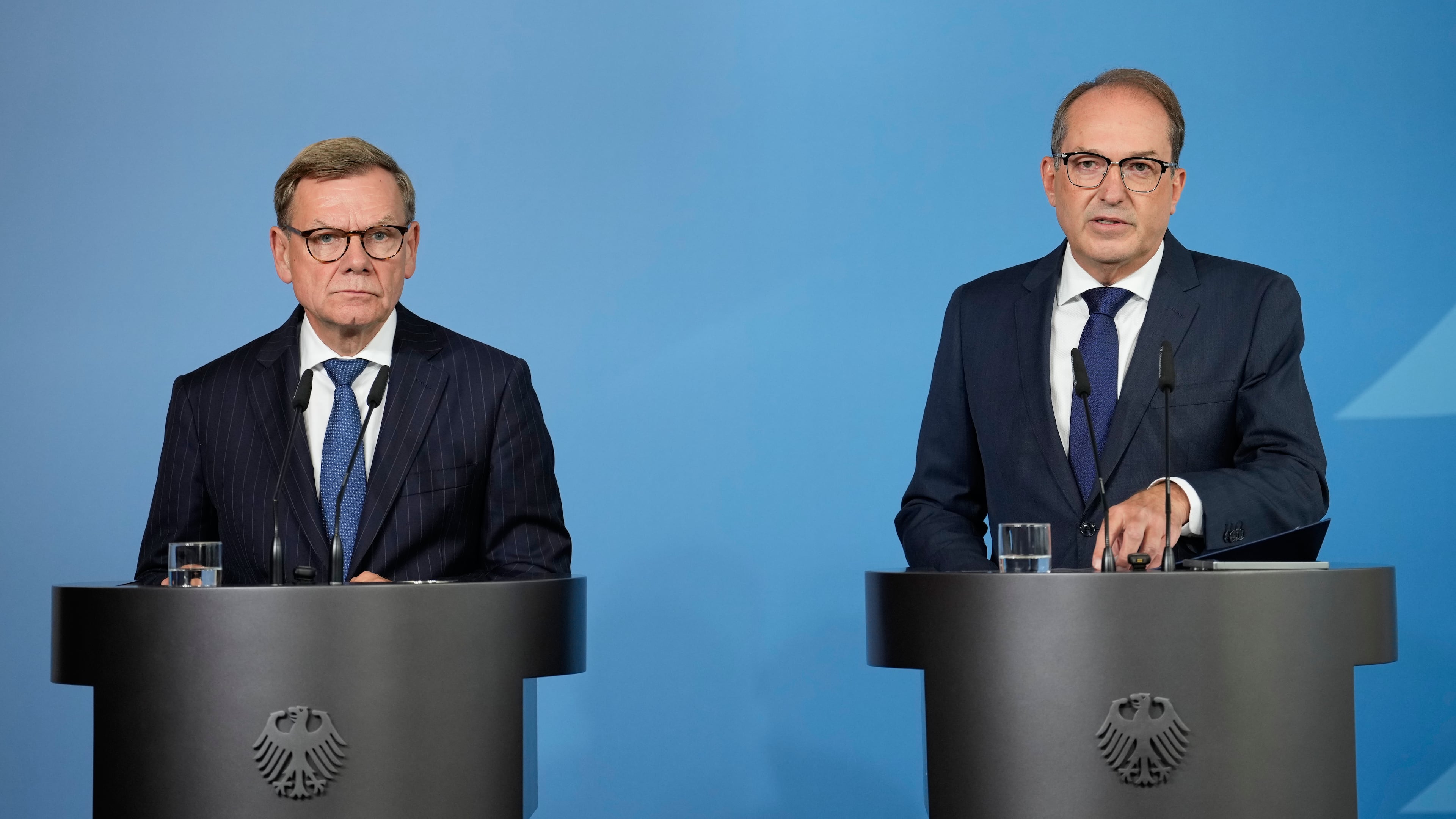 Germany's Interior Minister Alexander Dobrindt and Germany's Foreign Minister Johann Wadephul speak to the media during a press conference in Berlin on Tuesday, Sept. 1, 2026, about the attempted attack on Leipzig/Halle Airport last month with a drone loaded with explosives.(AP Photo/Ebrahim Noroozi)
