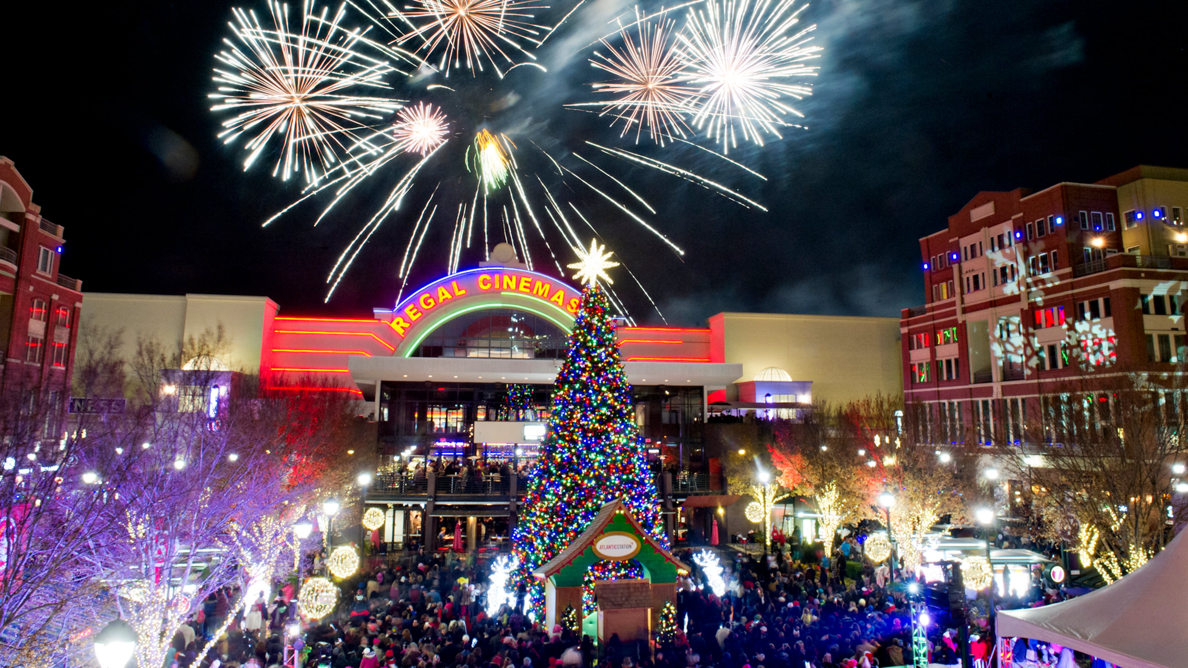 November 23, 2013 Atlanta - Fireworks go off above the tree at Atlantic Station in Atlanta during the annual Christmas tree lighting as thousands of people watch the show on Saturday, November 23, 2013. The all-day celebration had live music, arts, live reindeer, delicious winter treats, and activities for the whole family. JONATHAN PHILLIPS / SPECIAL