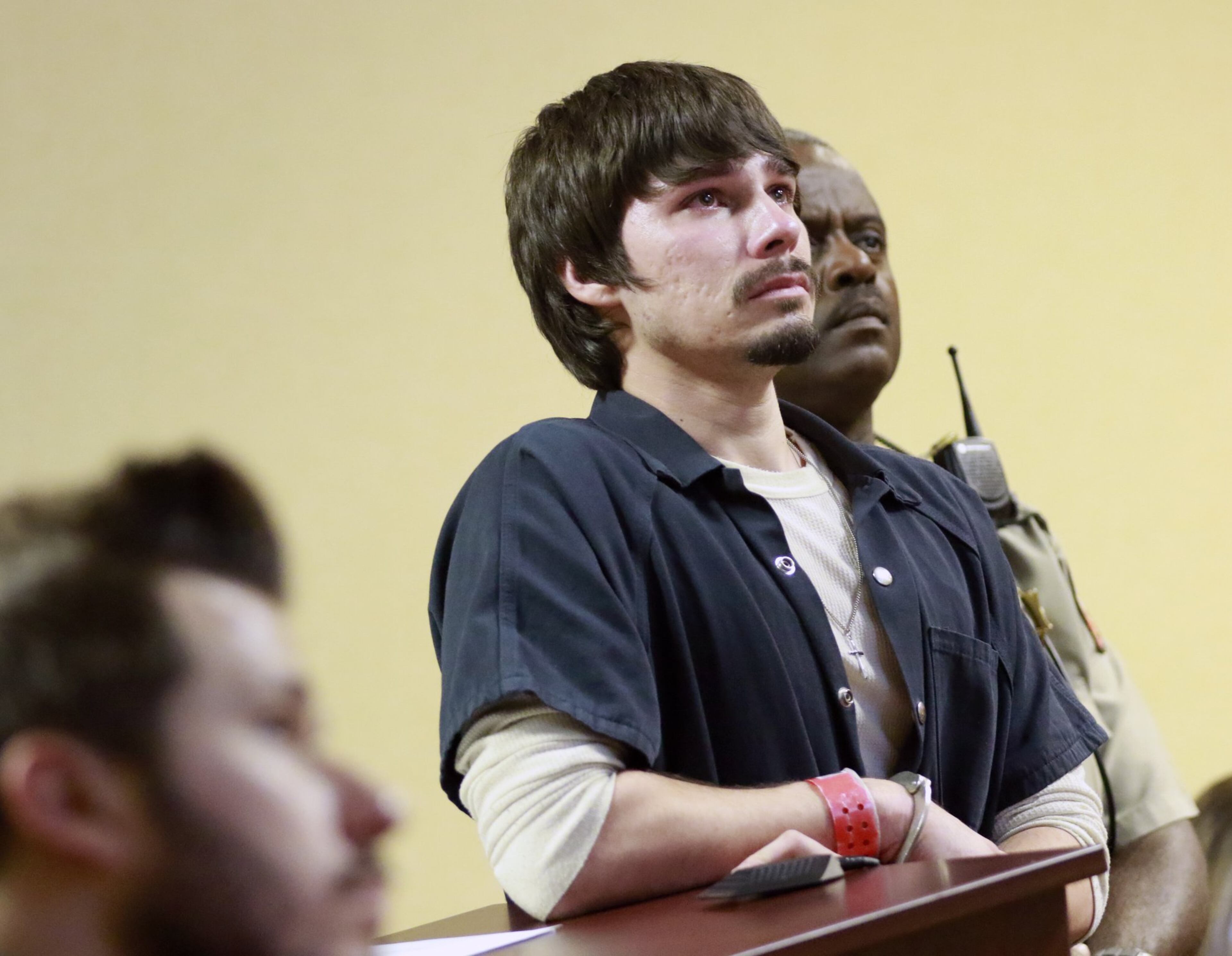 August 3, 2016 - Monroe, GA - Justin Whited watches a video showing the condition and care of his daughter. He had not seen her since she was taken to the hospital. BOB ANDRES / BANDRES@AJC.COM