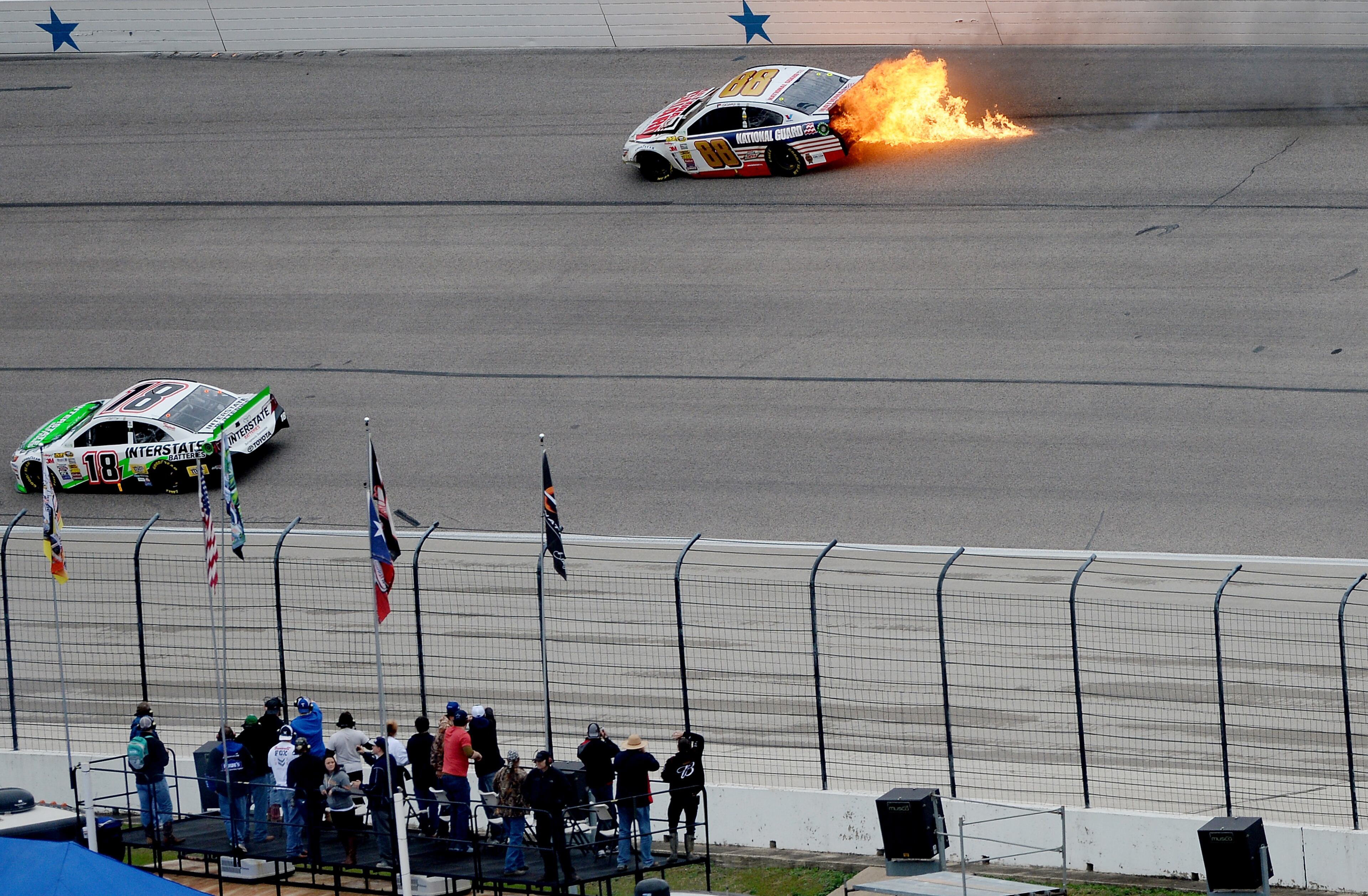 Dale Earnhardt Jr., driver of the #88 National Guard Chevrolet, crashes early in the NASCAR Sprint Cup Series Duck Commander 500 at Texas Motor Speedway on April 7, 2014 in Fort Worth, Texas. (Photo by Patrick Smith/Getty Images)