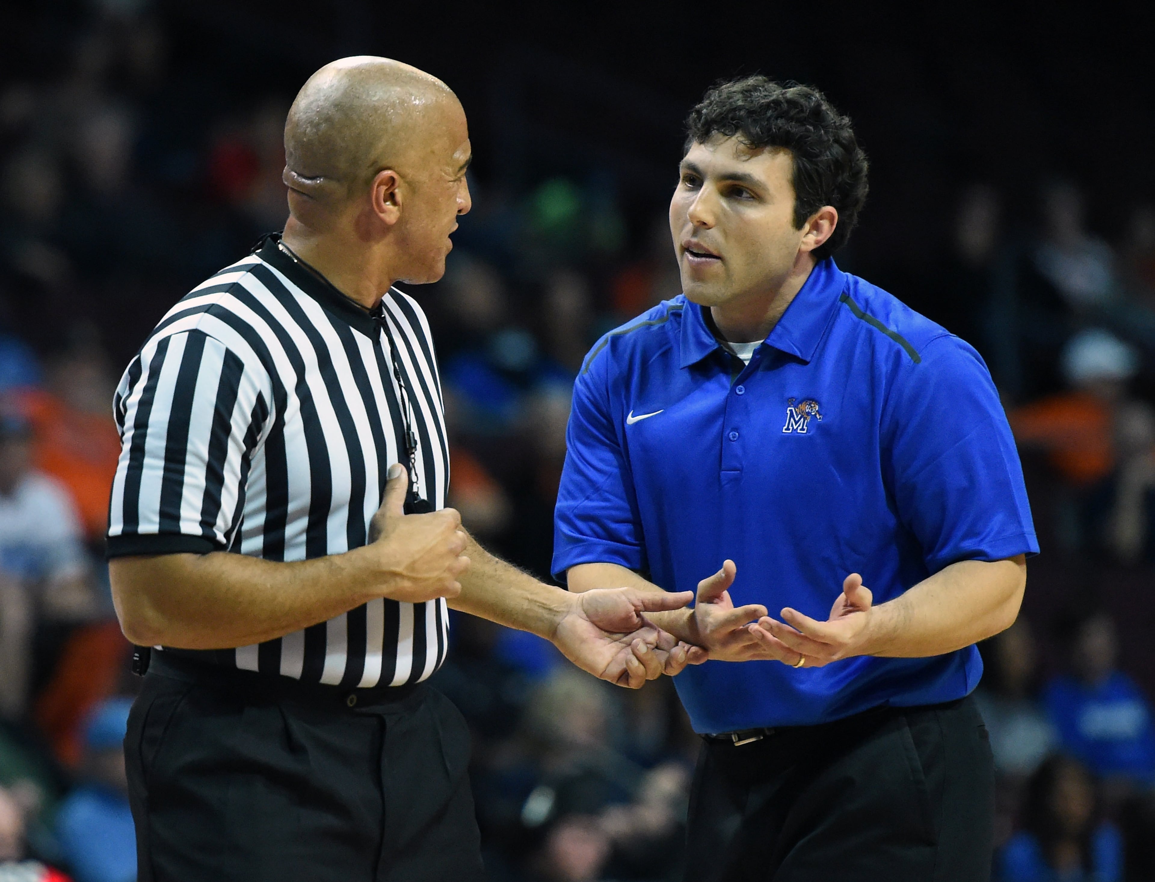 Head coach Josh Pastner of the Memphis Tigers talks with a referee. (Photo by Ethan Miller/Getty Images)