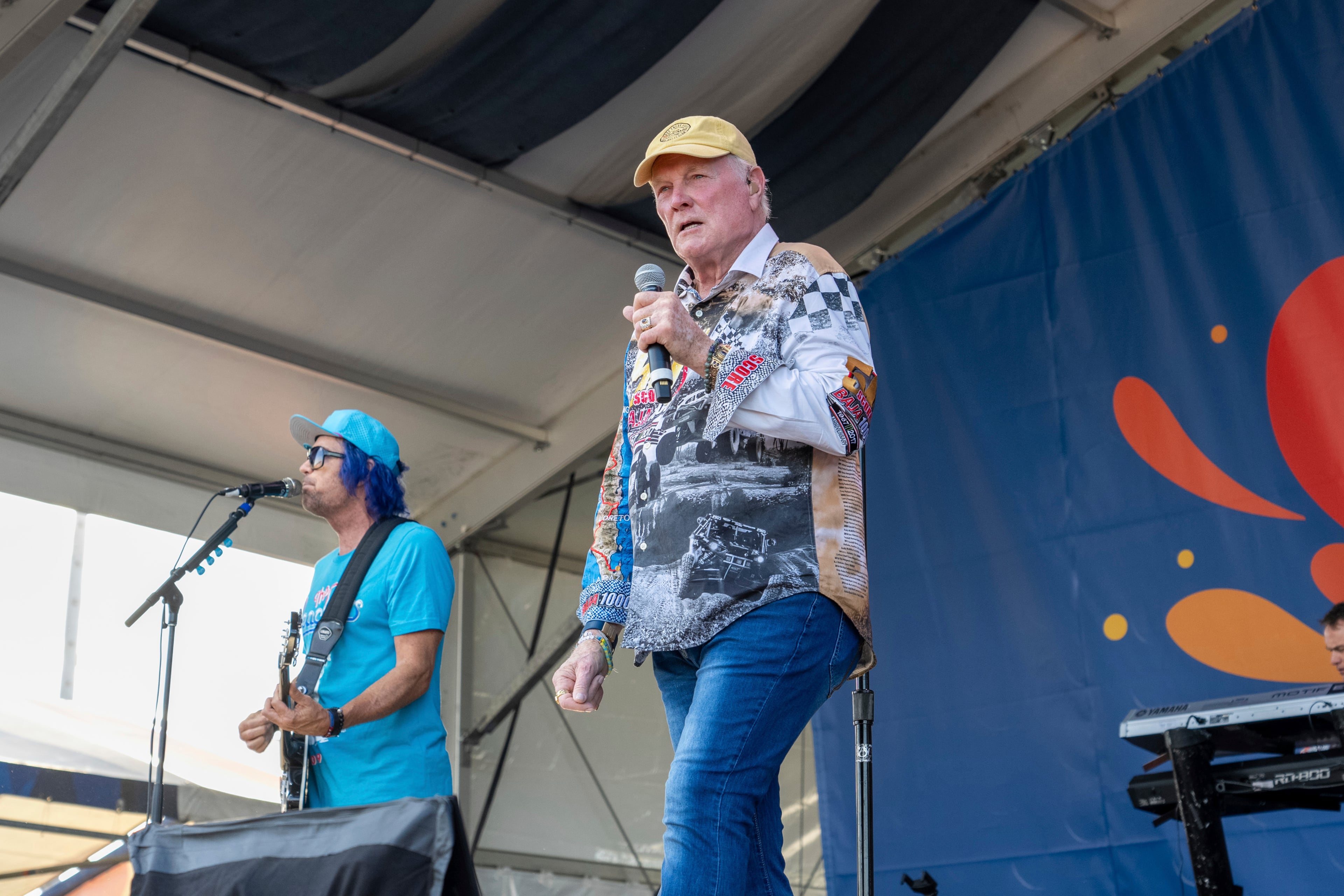 Mike Love (center) of the Beach Boys performs during the New Orleans Jazz & Heritage Festival in 2024 in New Orleans. (Amy Harris/AP)