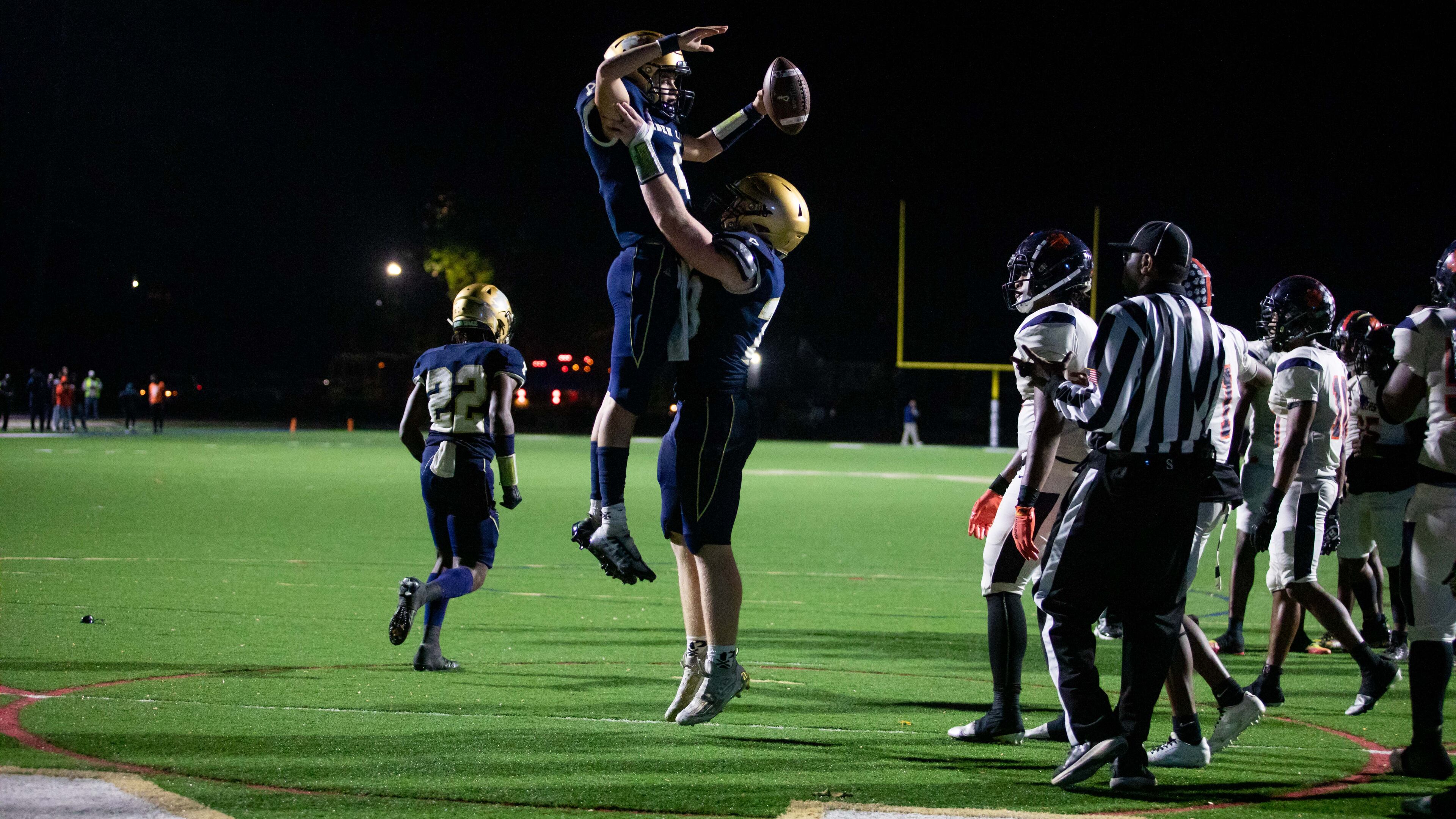 St. Pius players celebrate a touchdown during a GHSA High School football game between St. Pius and Mundy’s Mill at St. Pius Catholic School in Atlanta, GA, on Friday, November 11, 2022.(Photo/Jenn Finch)