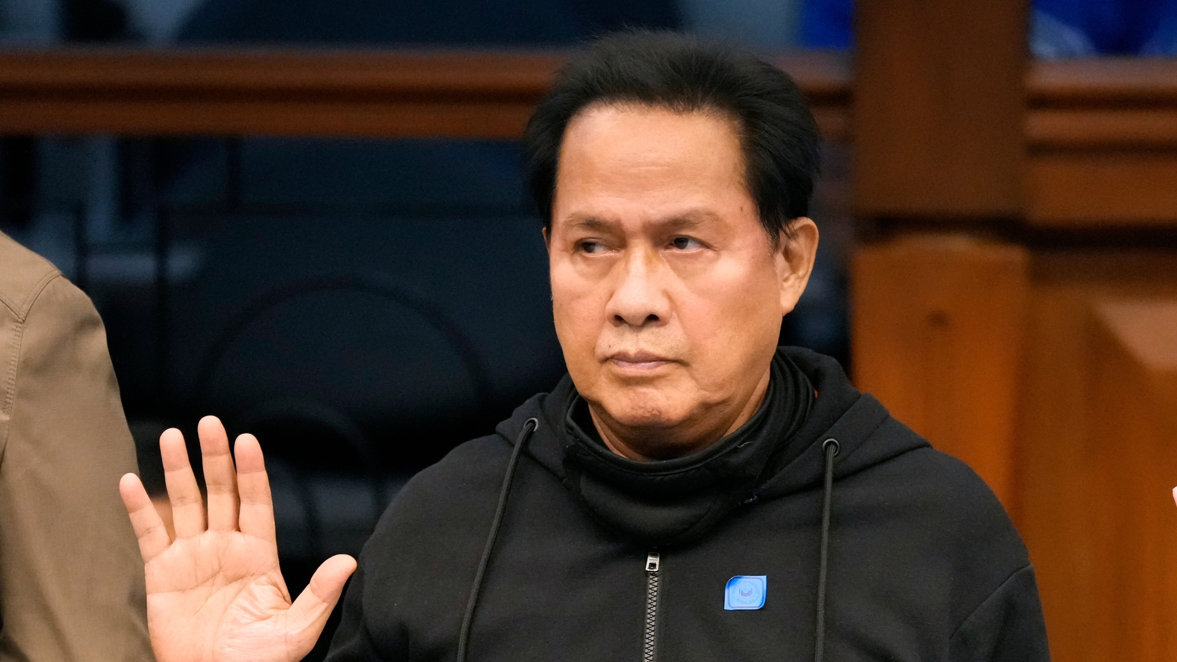 FILE - Apollo Quiboloy takes his oath as he attends a hearing at the Philippine Senate on Oct. 23, 2024, in Manila, Philippines. (AP Photo/Aaron Favila, File)