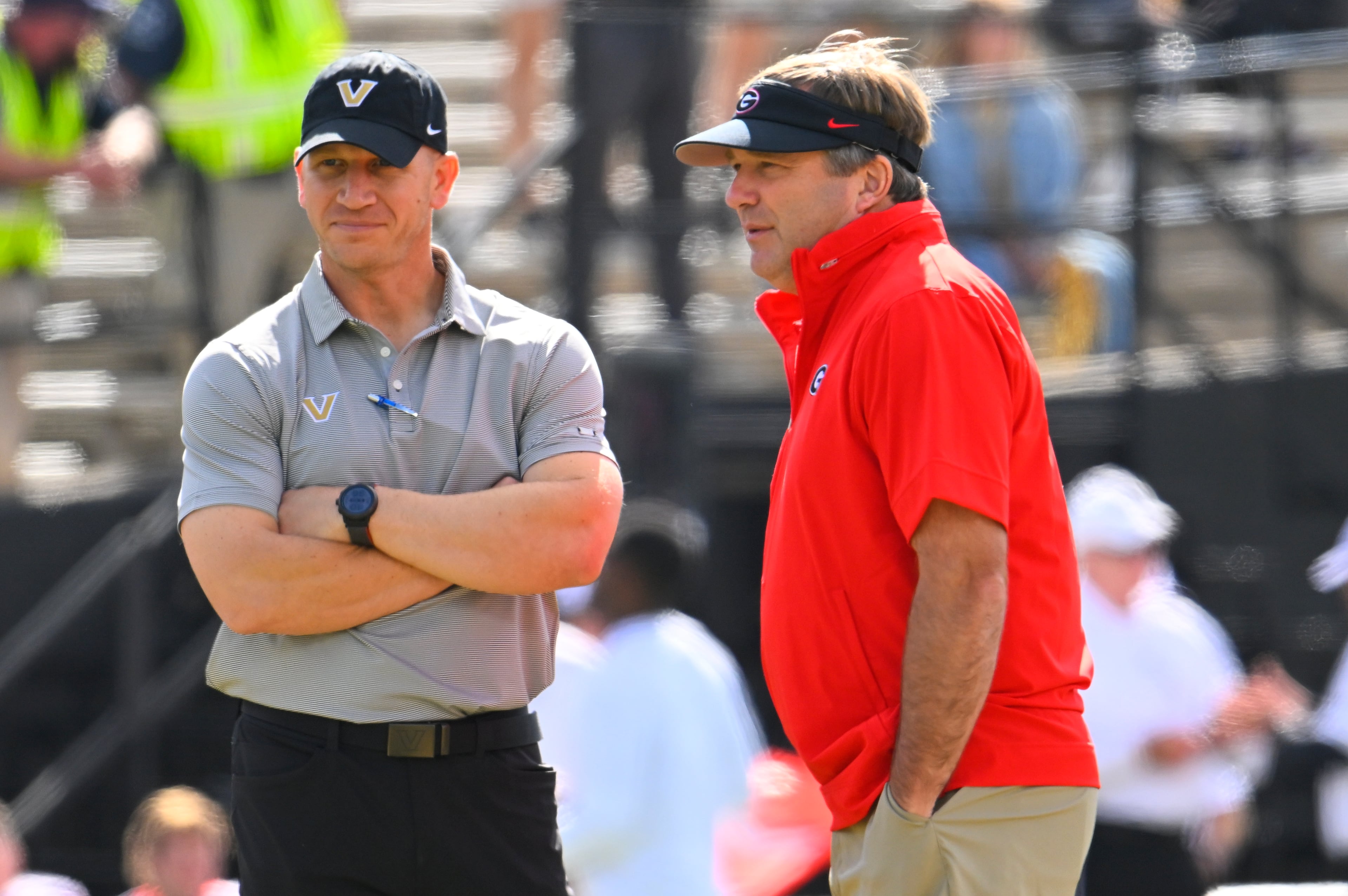Georgia coach Kirby Smart (right) and Vanderbilt coach Clark Lea before their 2023 game, which the Bulldogs won 37-20. (John Amis for the AJC)
