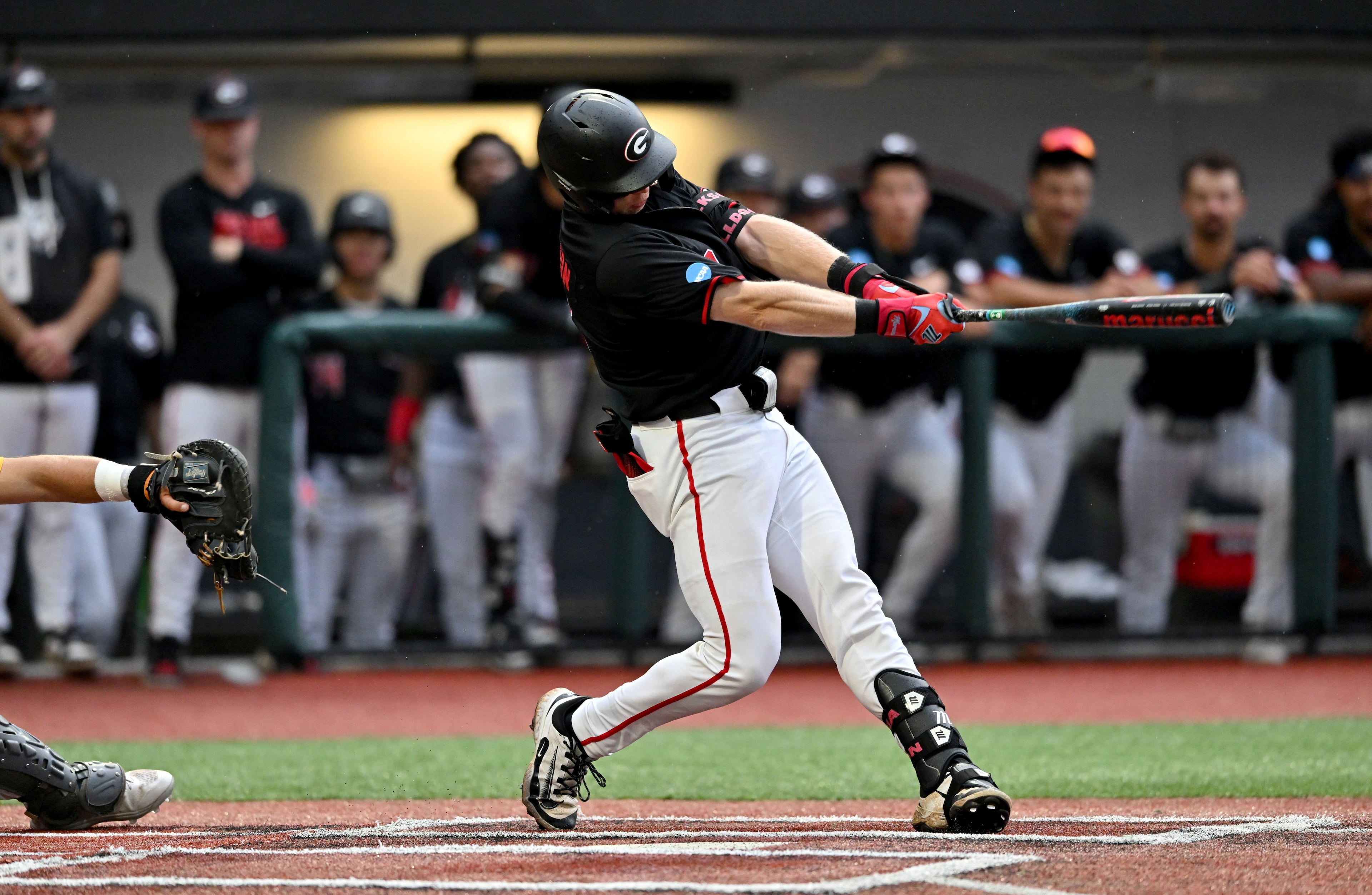 Georgia catcher Daniel Jackson (3) hits a solo home run during the fifth inning of their NCAA Regional game at Foley Field, Friday, May 29, 2026, in Athens. (Hyosub Shin/AJC)