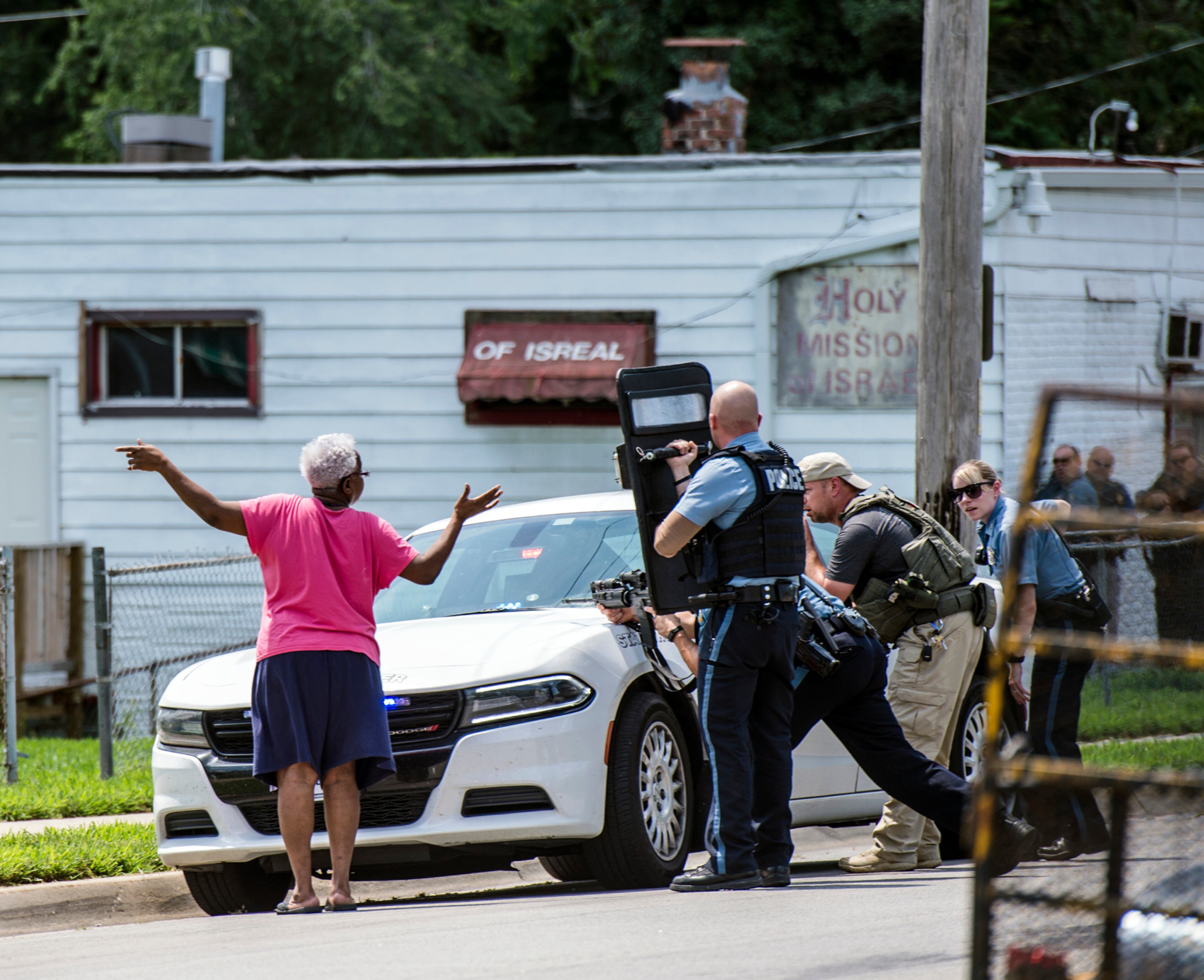 Police show up in force at the 1600 block of Quandaro Boulevard in Kansas City, Kan., on Tuesday, July 19, 2016. Shortly before 2 p.m., multiple shots were fired, and Capt. Robert Melton was fatally wounded. (Allison Long/Kansas City Star/TNS)