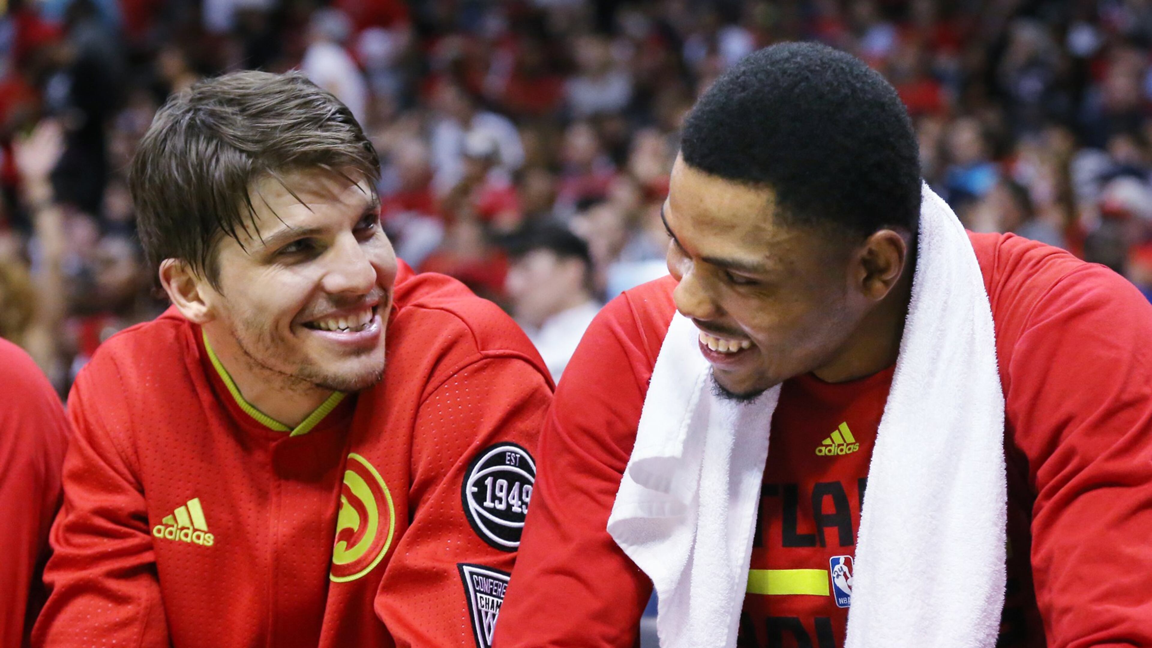 With the game well in hand Hawks Kyle Korver and Kent Bazemore share a laugh on the bench in the final minutes of a victory over the Celtics in Game 5 of an NBA basketball first-round playoff series at Philips Arena on Tuesday, April 26, 2016, in Atlanta. Curtis Compton / ccompton@ajc.com