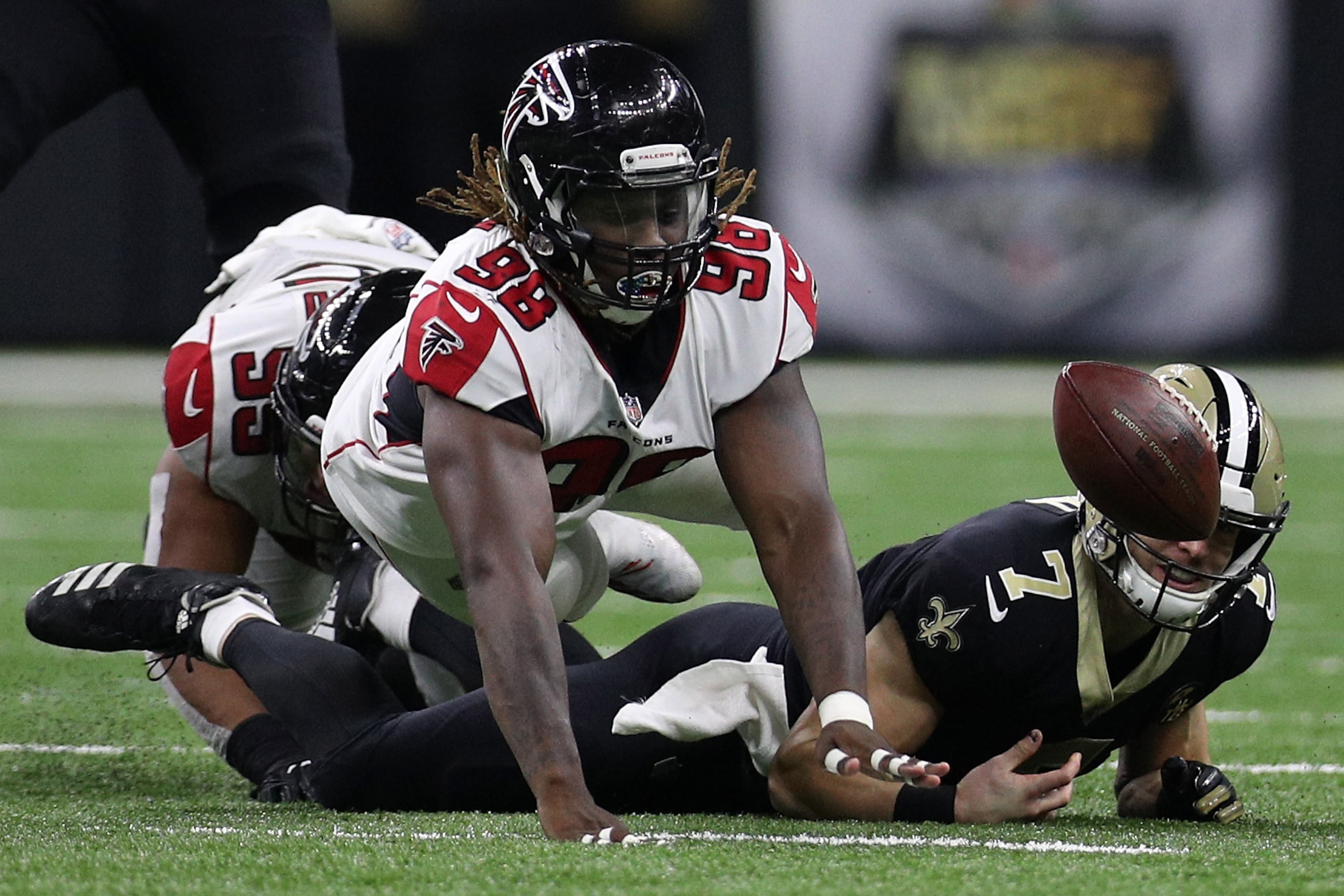 NEW ORLEANS, LA - NOVEMBER 22: Taysom Hill #7 of the New Orleans Saints fumbles the ball against the Atlanta Falcons at the Mercedes-Benz Superdome on November 22, 2018 in New Orleans, Louisiana. The play was overtunred. (Photo by Chris Graythen/Getty Images)