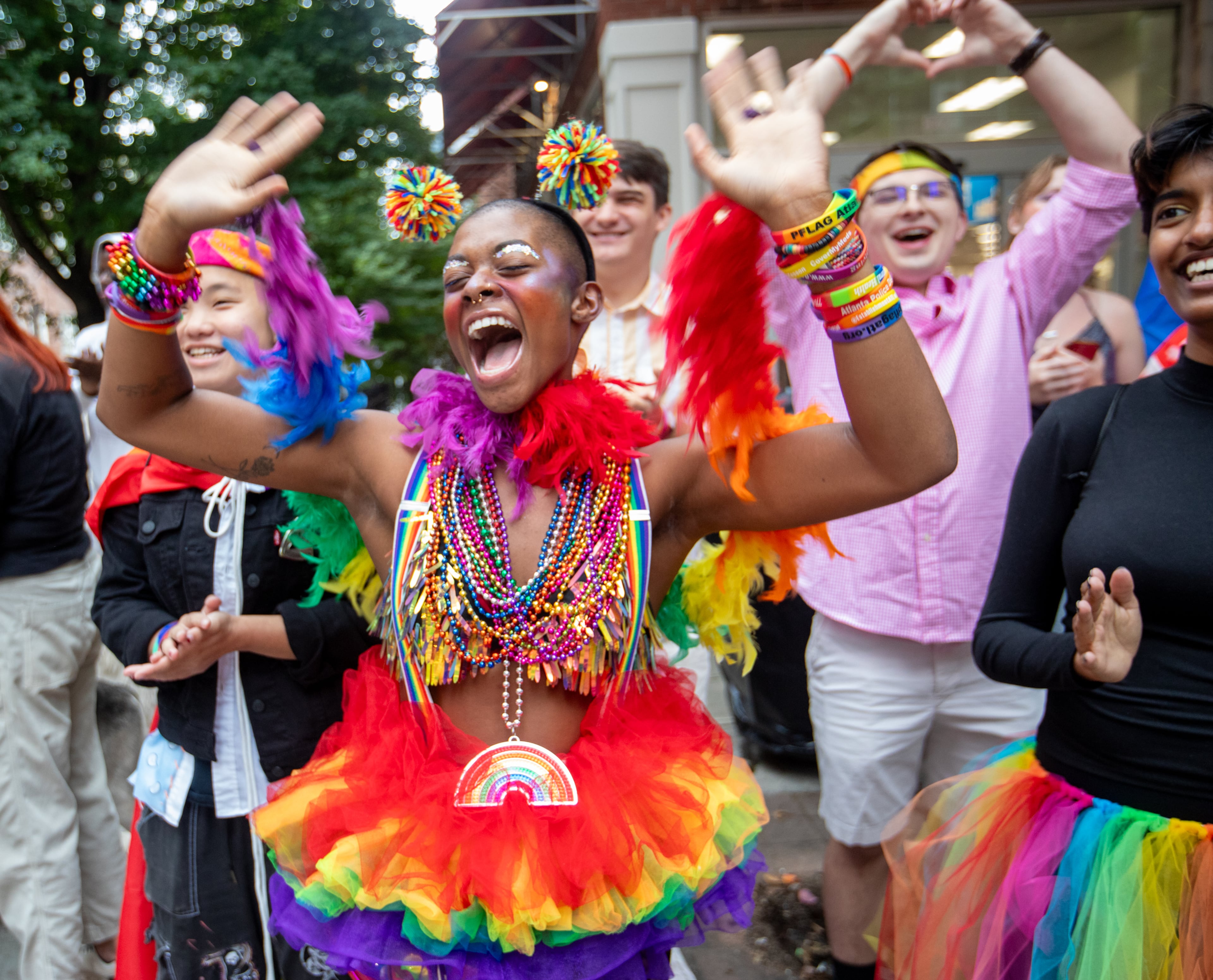 Aliyah Bradley-Davino, who identifies as demifluid, participates in the annual Pride Parade along Peachtree Street in Atlanta on Sunday, Oct. 15, 2023. (Jenni Girtman for The Atlanta Journal-Constitution)